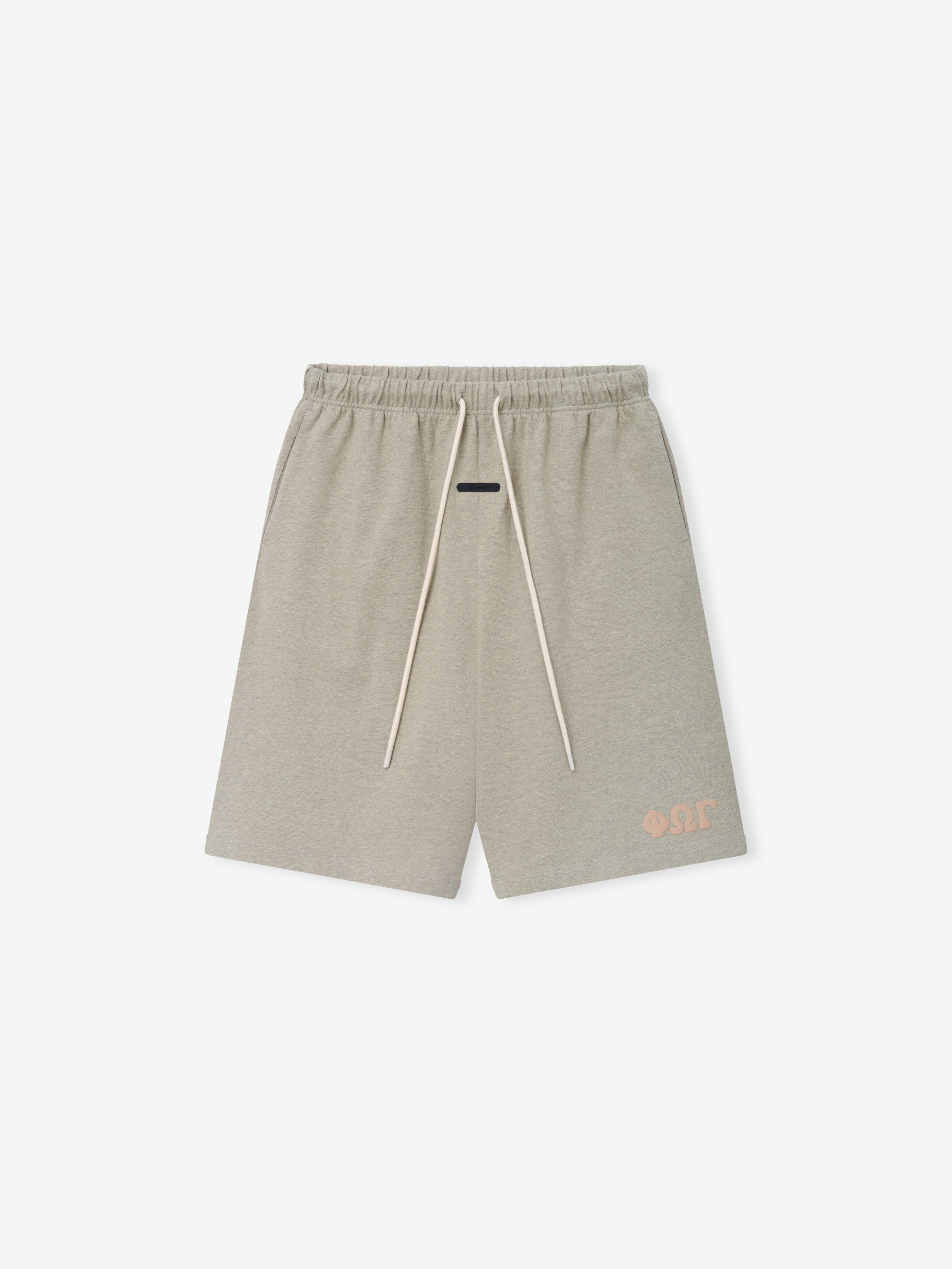 Heavy Jersey 90'S Sweatshort in a soft washed seal heather color, featuring an elastic waistband with long cream drawstrings, side pockets, and a subtle peach-toned logo near the hem on casual bottoms.