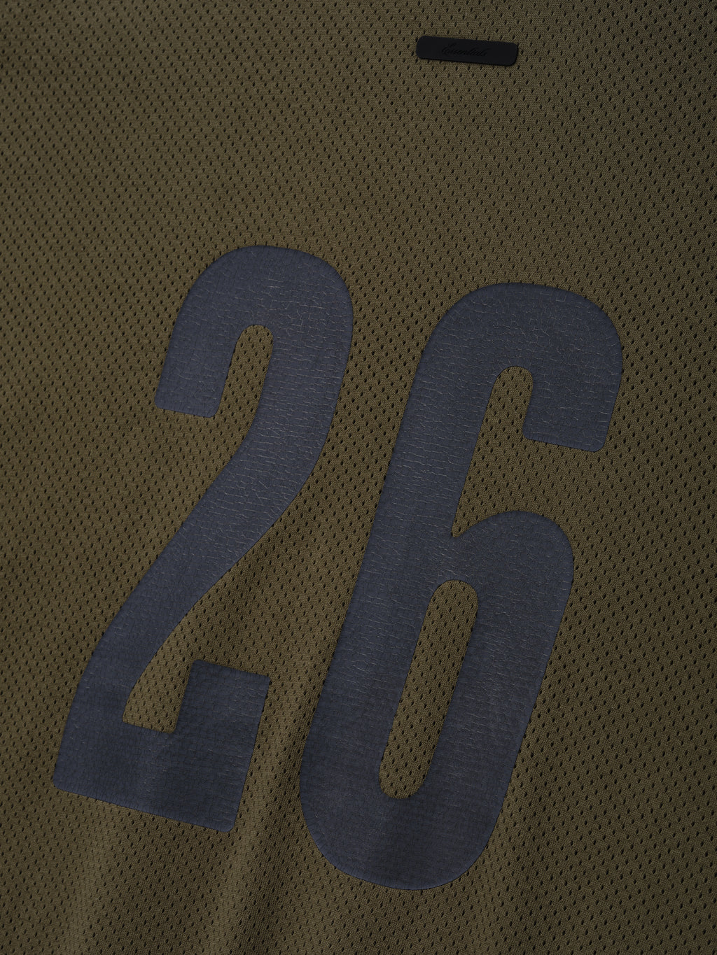 Sport Mesh Merch Tee in moss green featuring breathable mesh fabric with a large contrasting number 26 printed on the back for a bold athletic style.