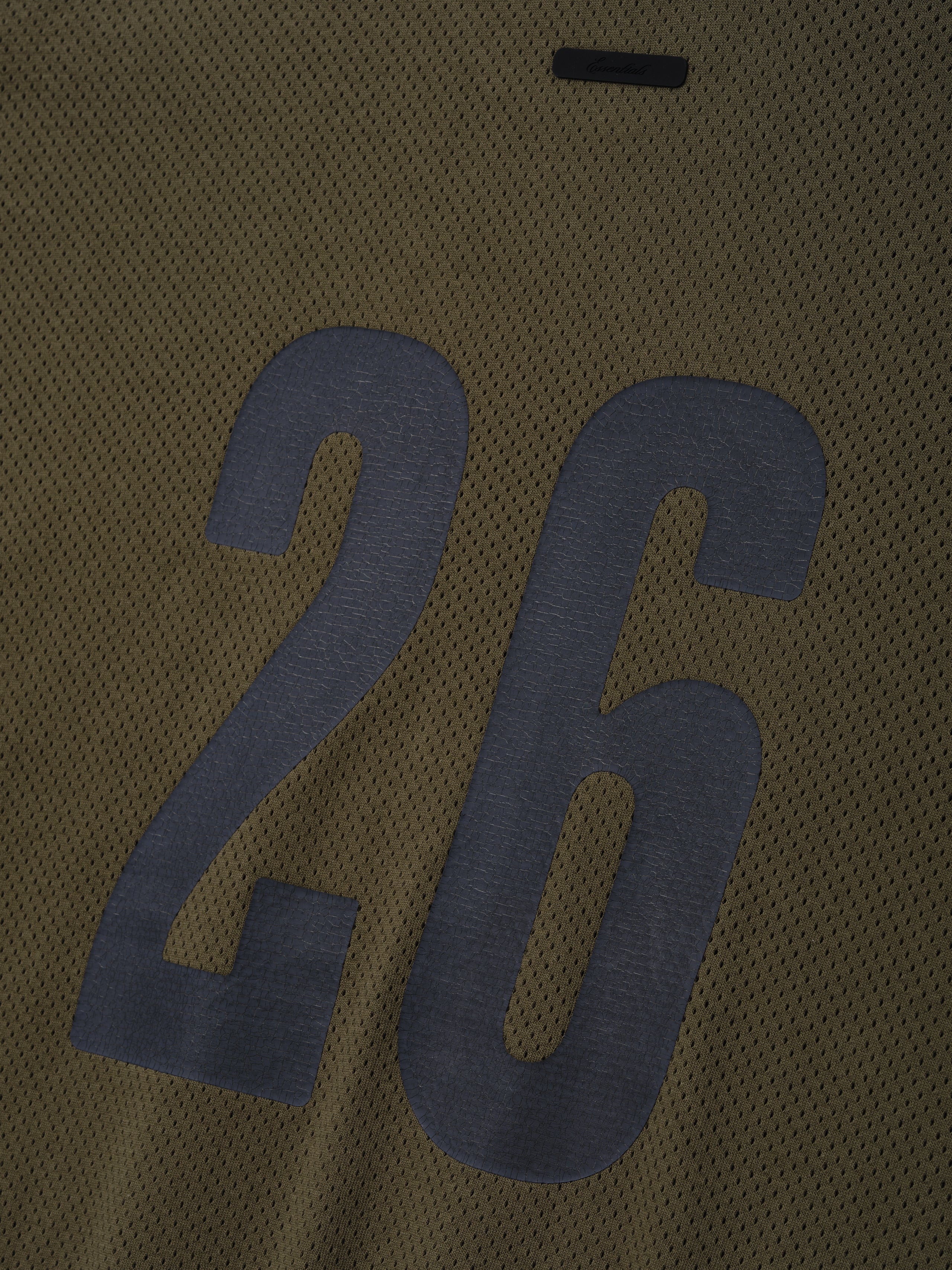 Sport Mesh Merch Tee in moss green featuring breathable mesh fabric with a large contrasting number 26 printed on the back for a bold athletic style.