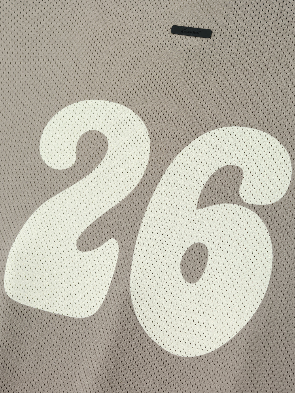 Sport Mesh Merch Long Sleeve Tee in a soft taupe mesh fabric featuring a large cream number 26 printed on the back for a breathable and sporty top.