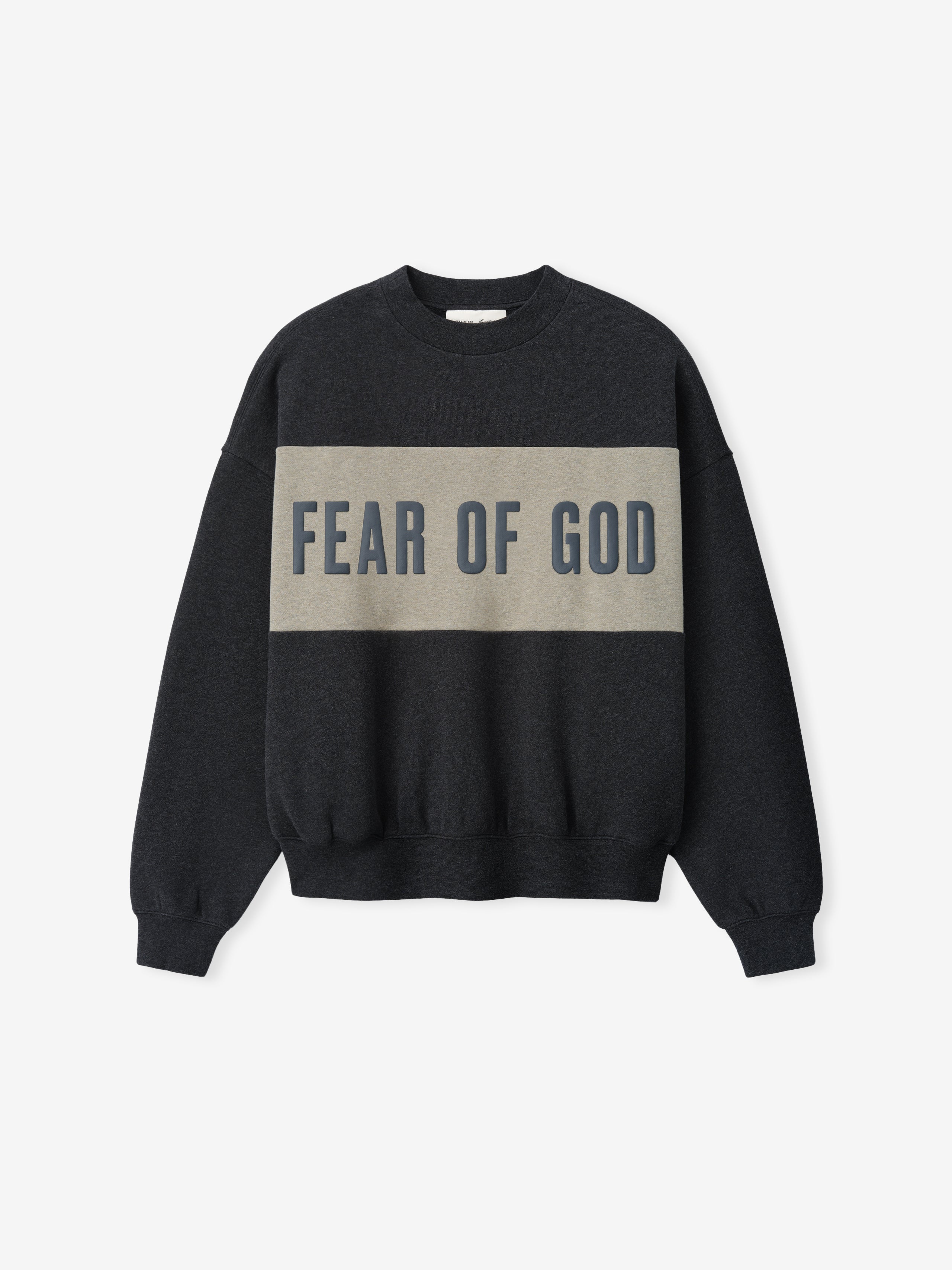 Cropped Relaxed Panelled Sweatshirt in dark iron grey with a contrasting muted taupe panel across the chest featuring bold Fear of God lettering, designed for casual streetwear layering.