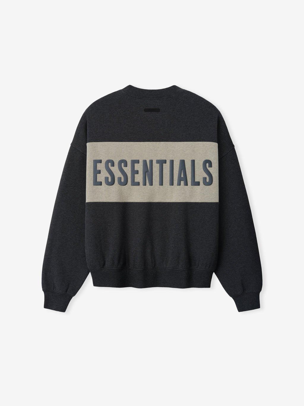 Cropped Relaxed Panelled Sweatshirt in dark charcoal with a wide muted beige horizontal panel across the back featuring bold navy "ESSENTIALS" lettering, designed with ribbed cuffs and hem for a cozy streetwear fit.