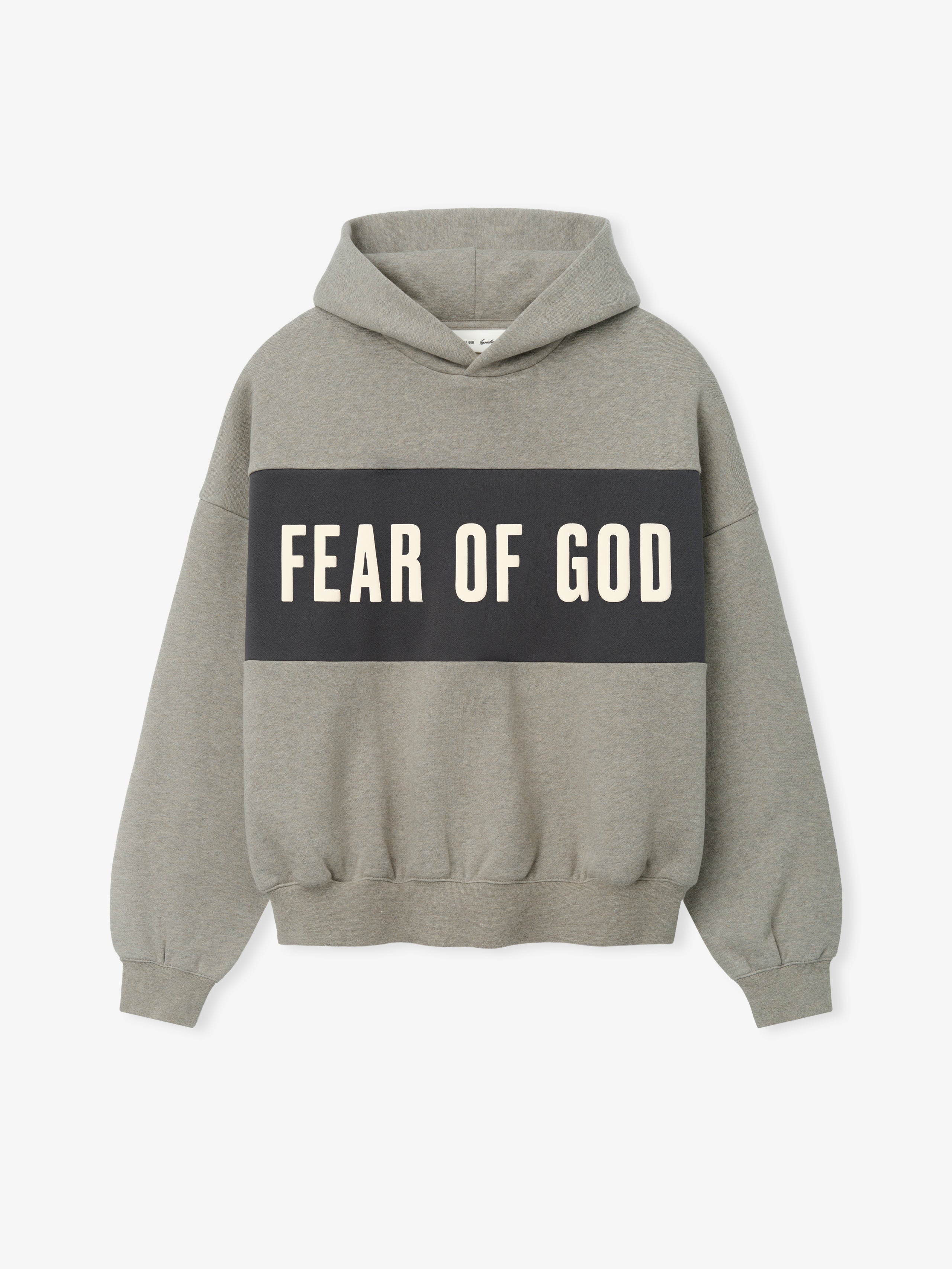 Cropped Relaxed Panelled Hoodie in a muted grey shade with a bold black horizontal panel across the chest displaying "Fear of God" in contrasting white letters, featuring a relaxed fit and ribbed cuffs.