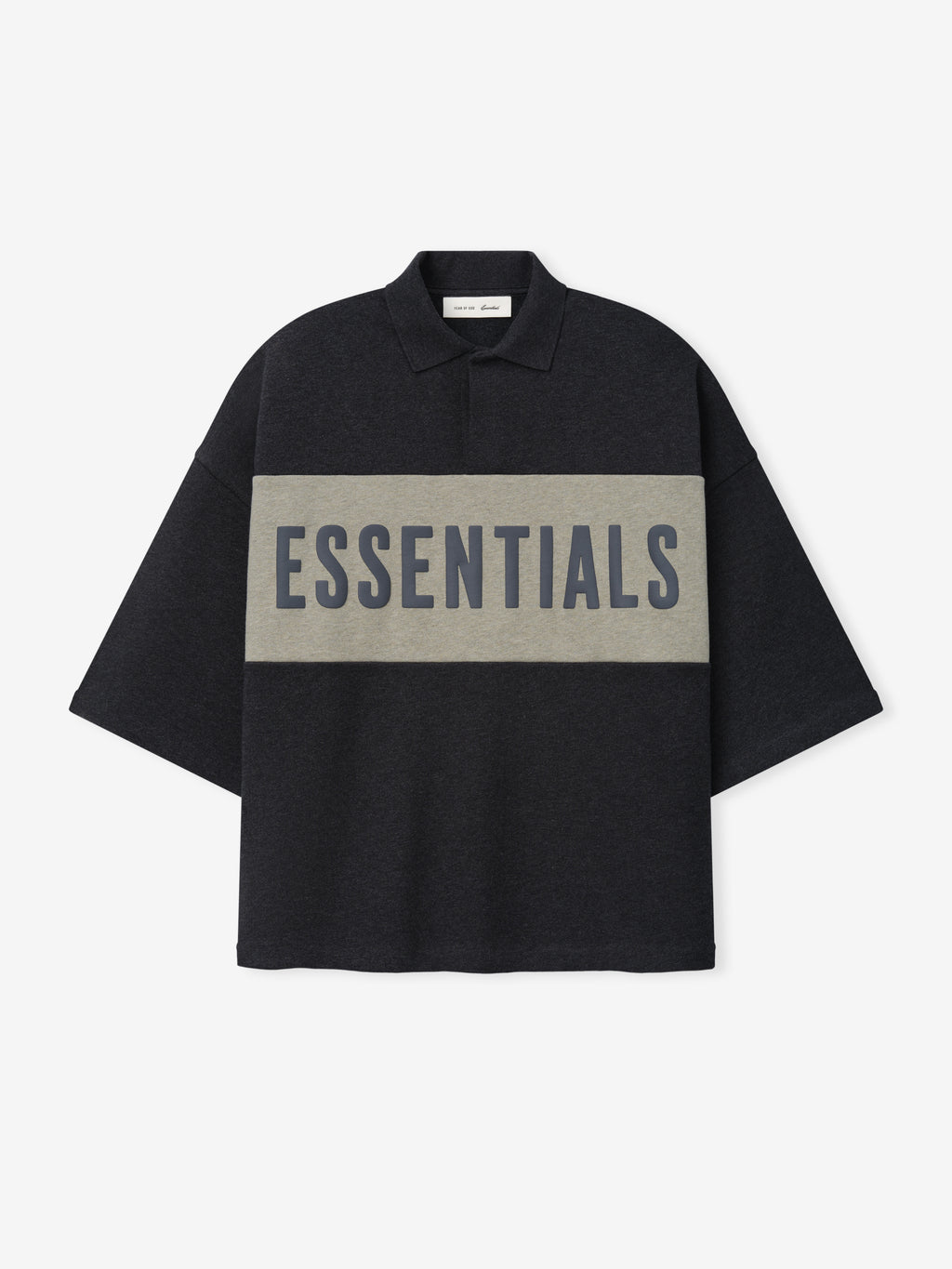 Cropped Panelled Polo in dark grey featuring a wide contrasting horizontal panel with bold lettering, designed with a classic collar and a loose, boxy fit for casual tops.
