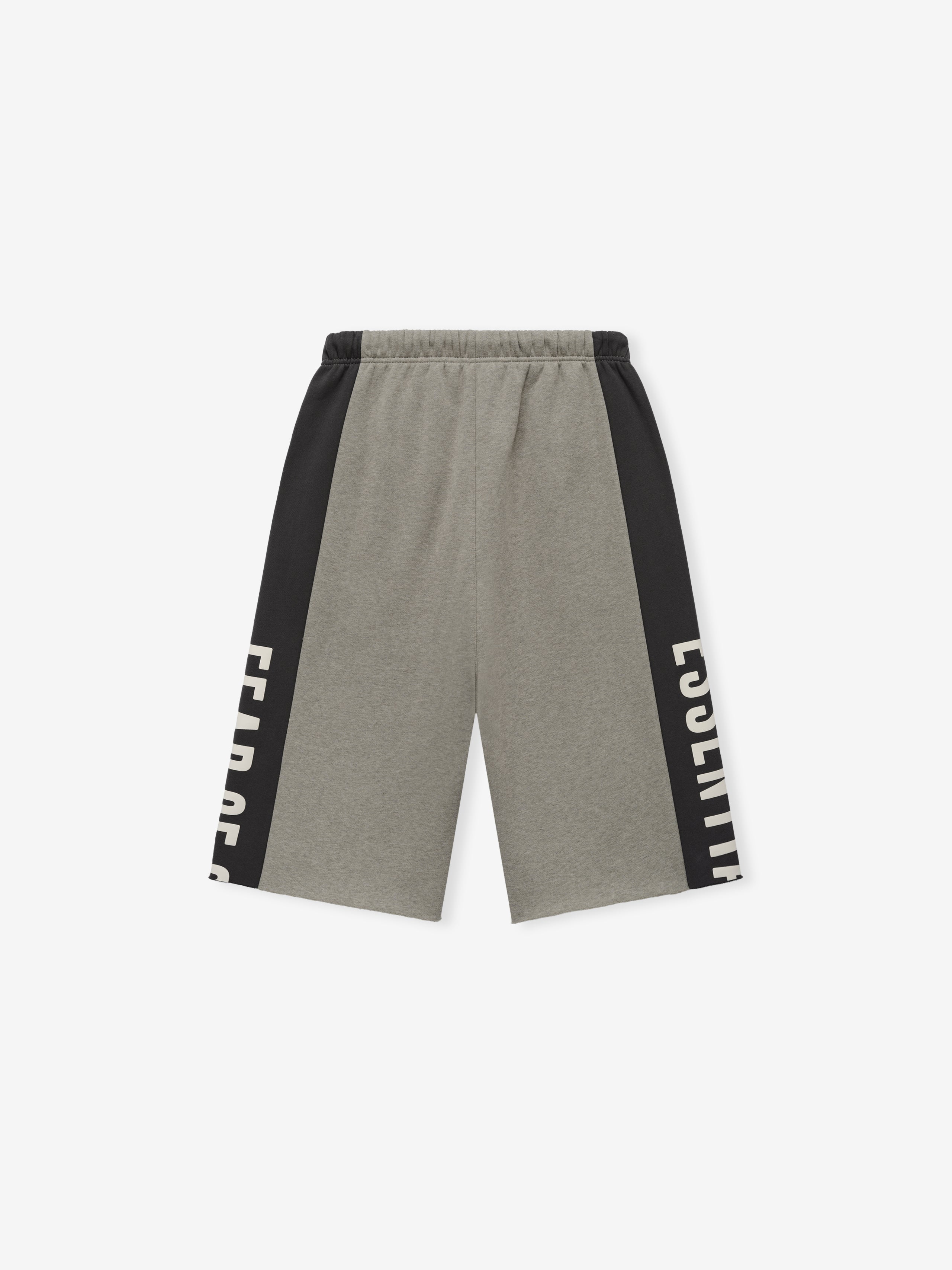 Panelled Raw Cut Off Sweatpant featuring muted grey fabric with contrasting black side panels displaying bold cream lettering, designed with an elastic waistband for casual bottoms.