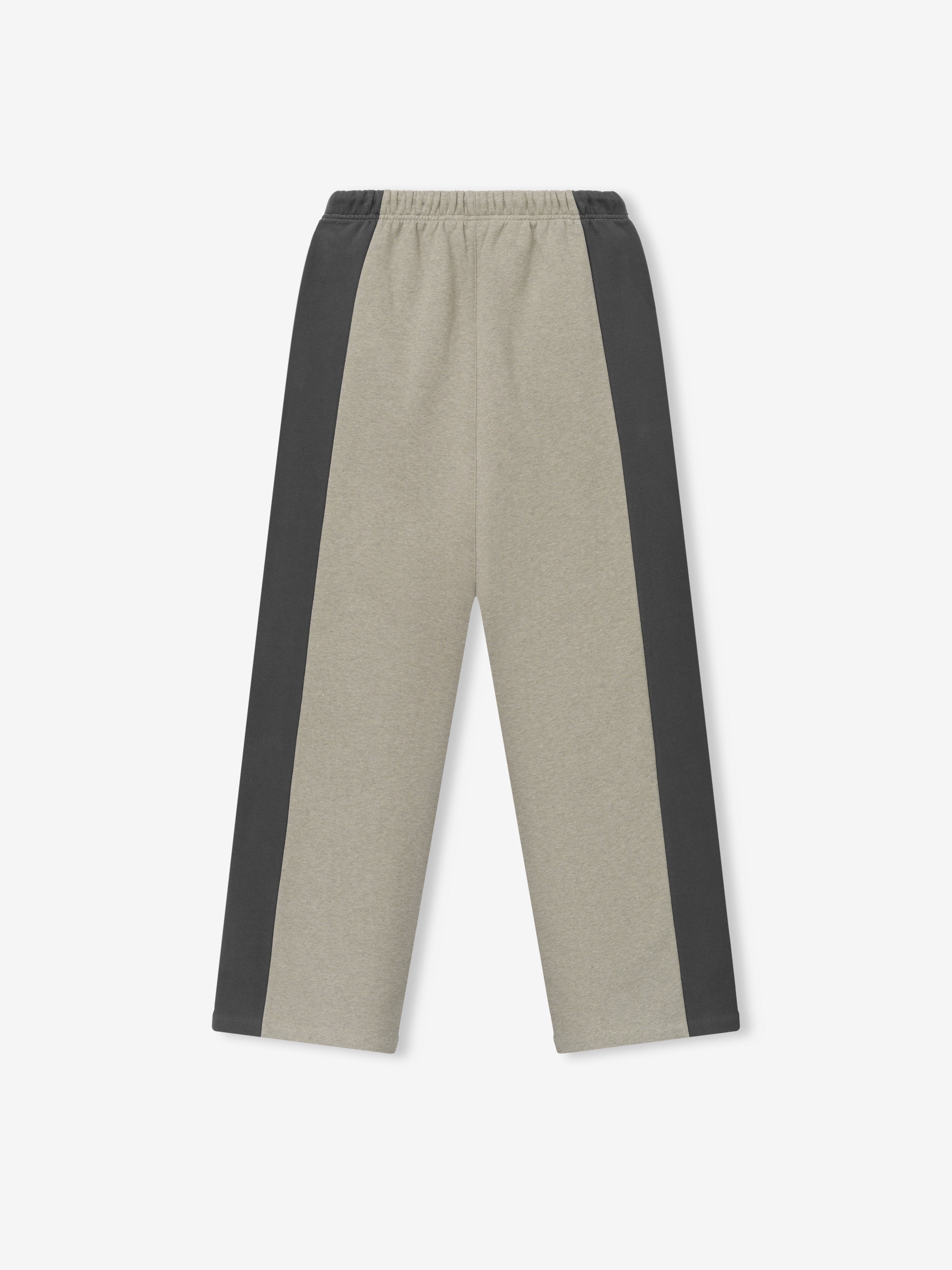Panelled Lounge Pant in a muted neutral tone with dark side panels, featuring a relaxed fit and elastic waistband for comfortable casual bottoms.