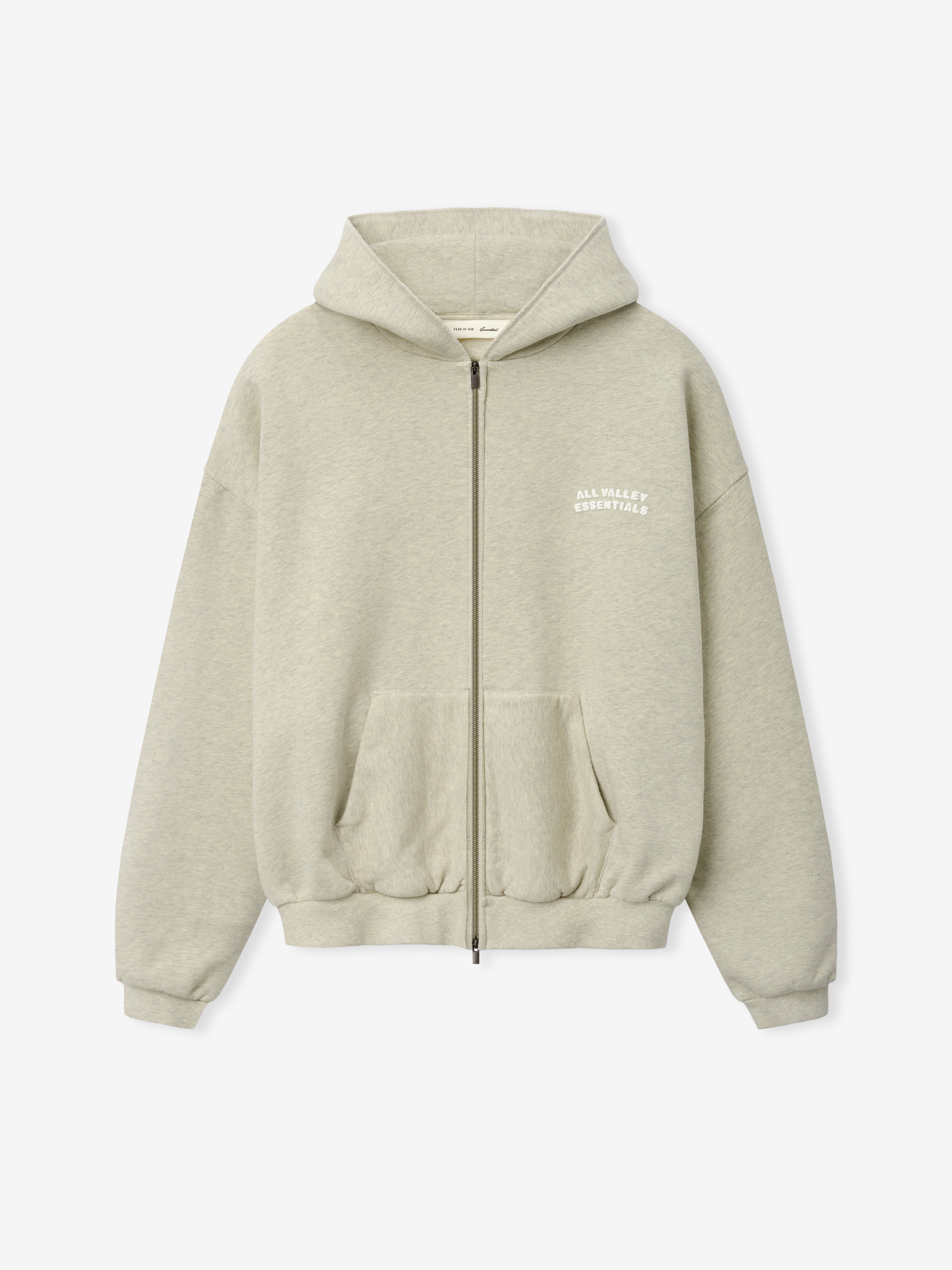 90'S Zip-Up Hoodie in a washed vanilla heather shade featuring a relaxed fit, full front zipper, spacious kangaroo pockets, ribbed cuffs and hem, and a small logo print on the chest.