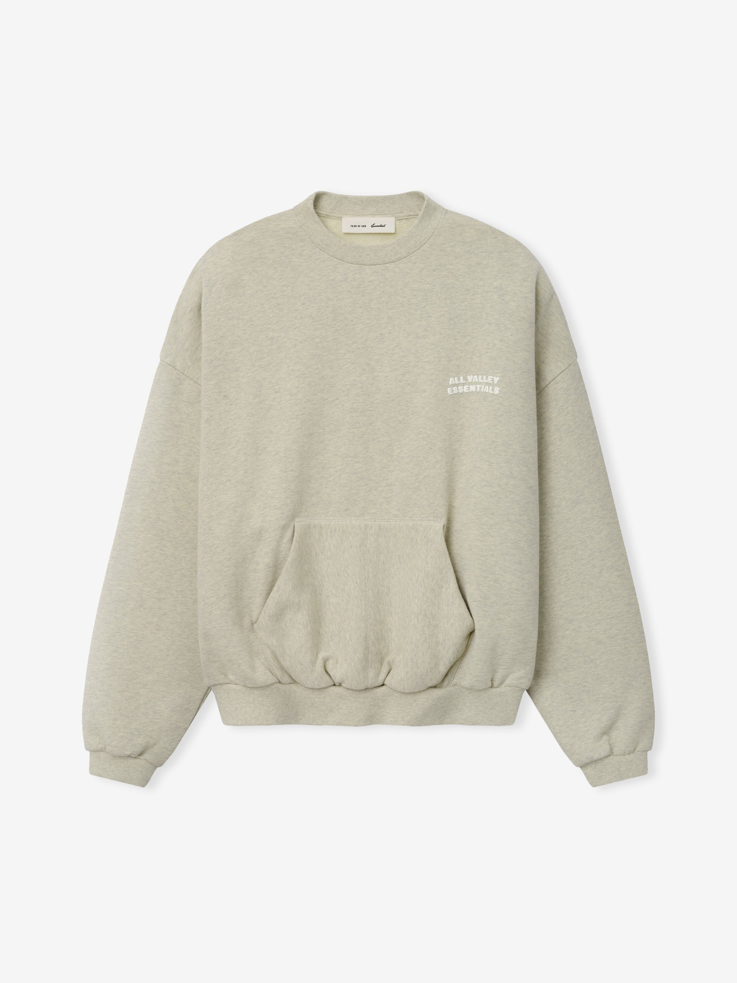 90s Sweatshirt in a soft washed vanilla heather shade, featuring a relaxed fit, ribbed cuffs and hem, front kangaroo pocket, and small contrasting chest text for casual tops.