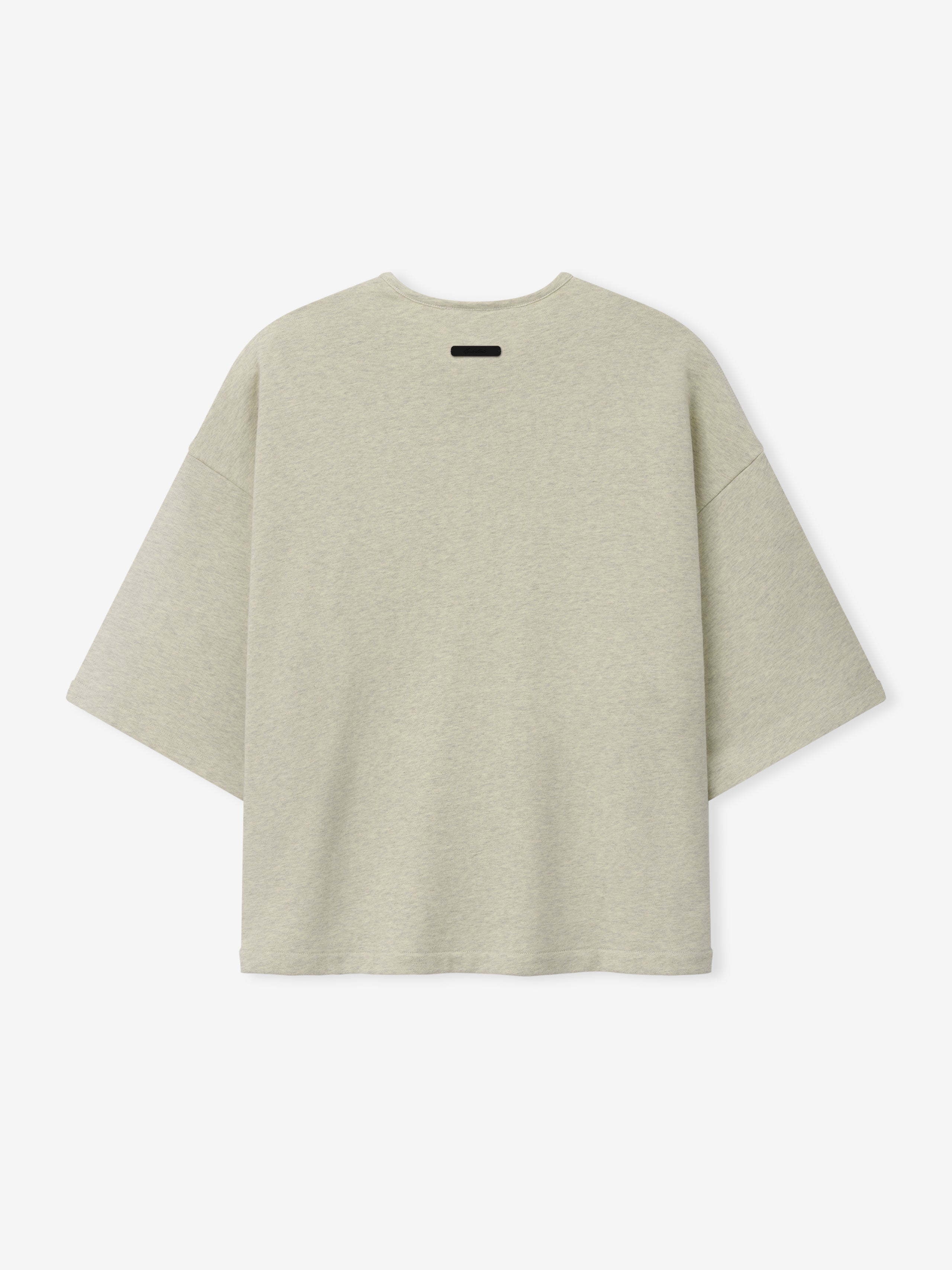 Back view of a washed vanilla heather 3/4 Henley Sweatshirt with dropped shoulders, wide sleeves, and a relaxed, boxy silhouette made from soft fabric.