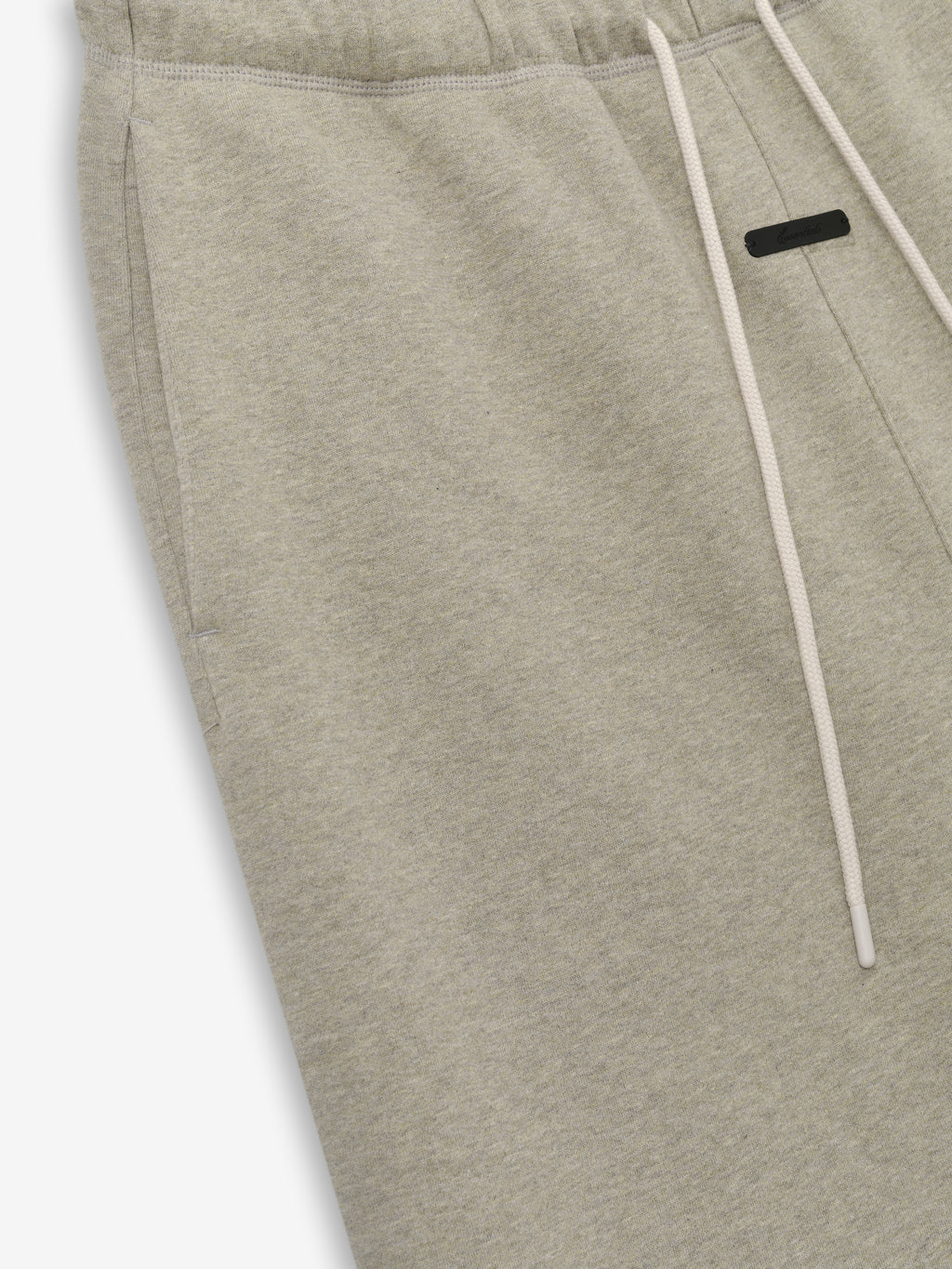 Flare Sweatpant in a light washed seal heather fabric featuring an elastic waistband with drawstrings and a side pocket for a casual and comfortable bottom option.