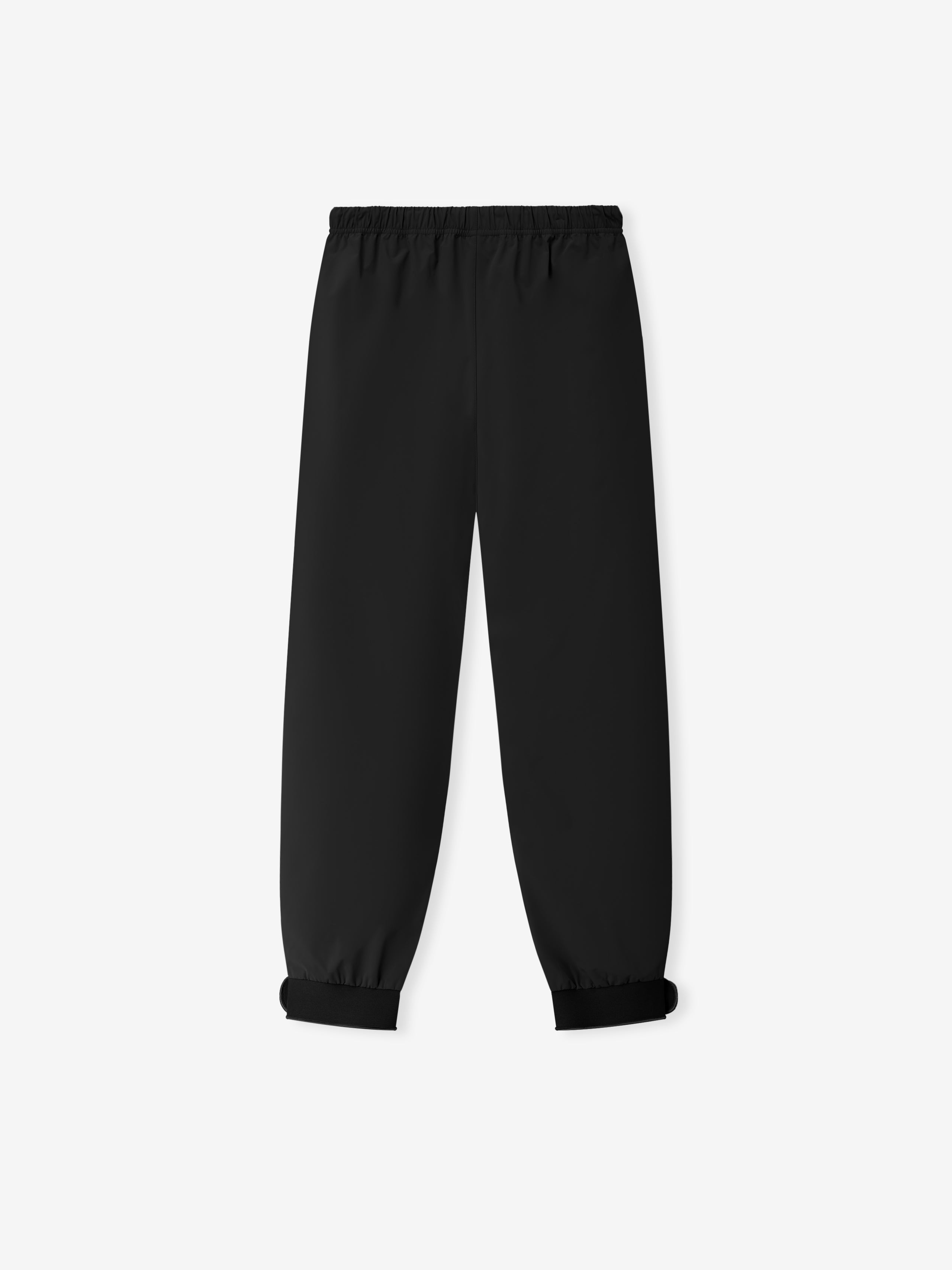 Storm Pant in a vintage black shade featuring a relaxed fit with elastic waistband and adjustable cuffs, designed as versatile bottoms for casual and contemporary styling.