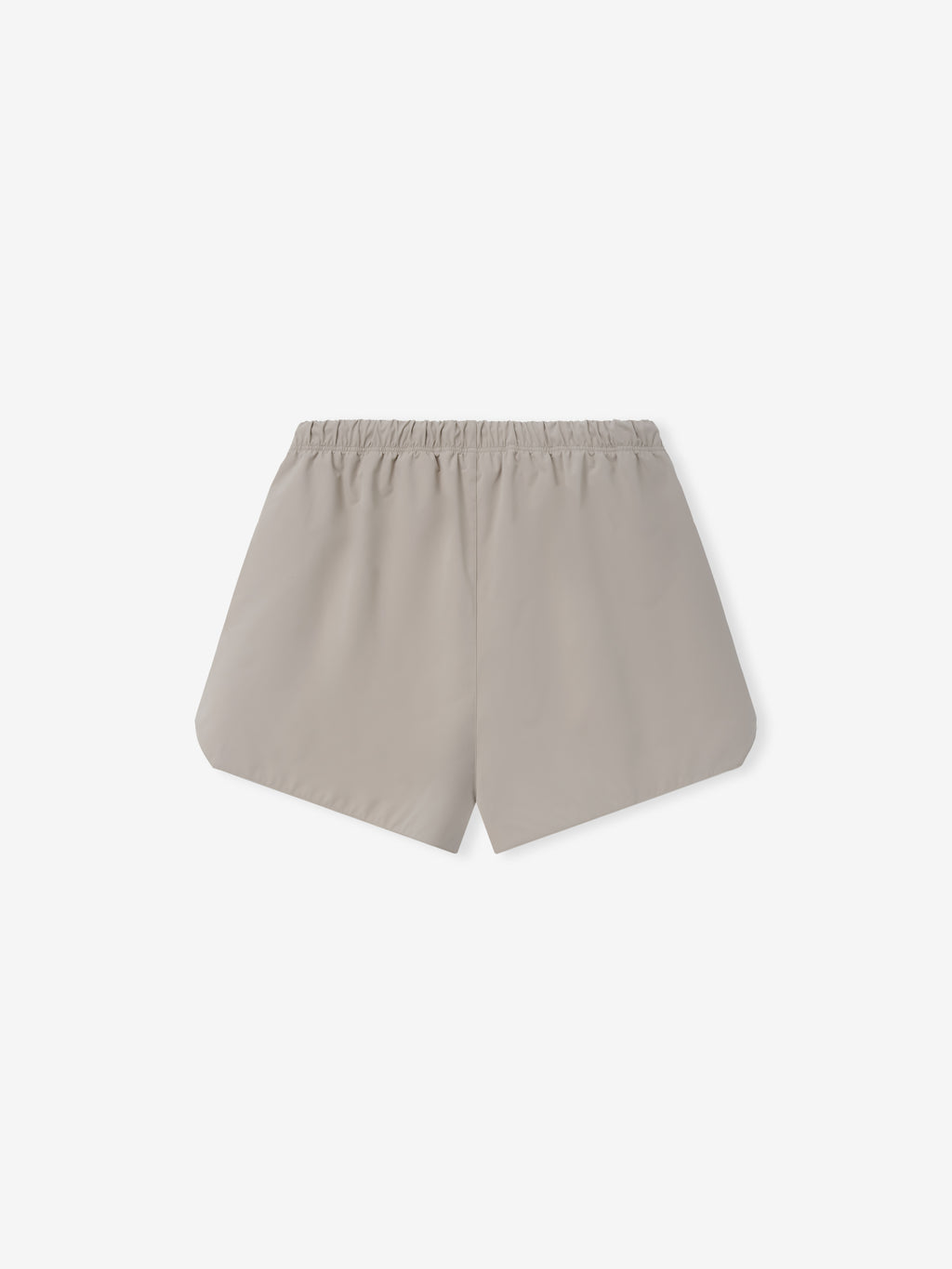 Gym Short in a soft neutral shade featuring an elastic waistband and clean, streamlined design for a simple and comfortable bottoms option.