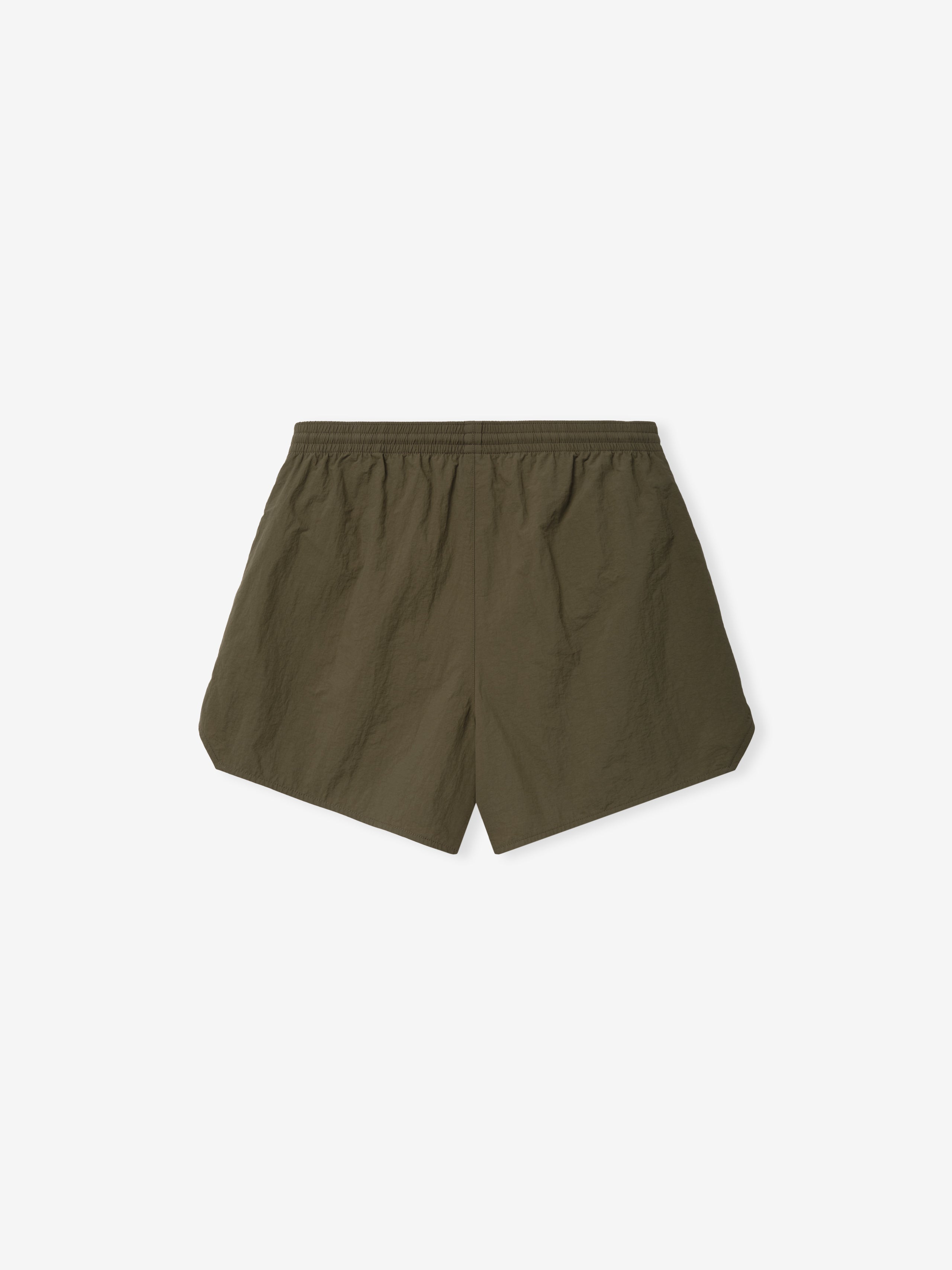 Nylon Swim Short in a muted olive green with a minimalist design, featuring a comfortable elastic waistband and a relaxed silhouette ideal for casual, water-friendly wear.