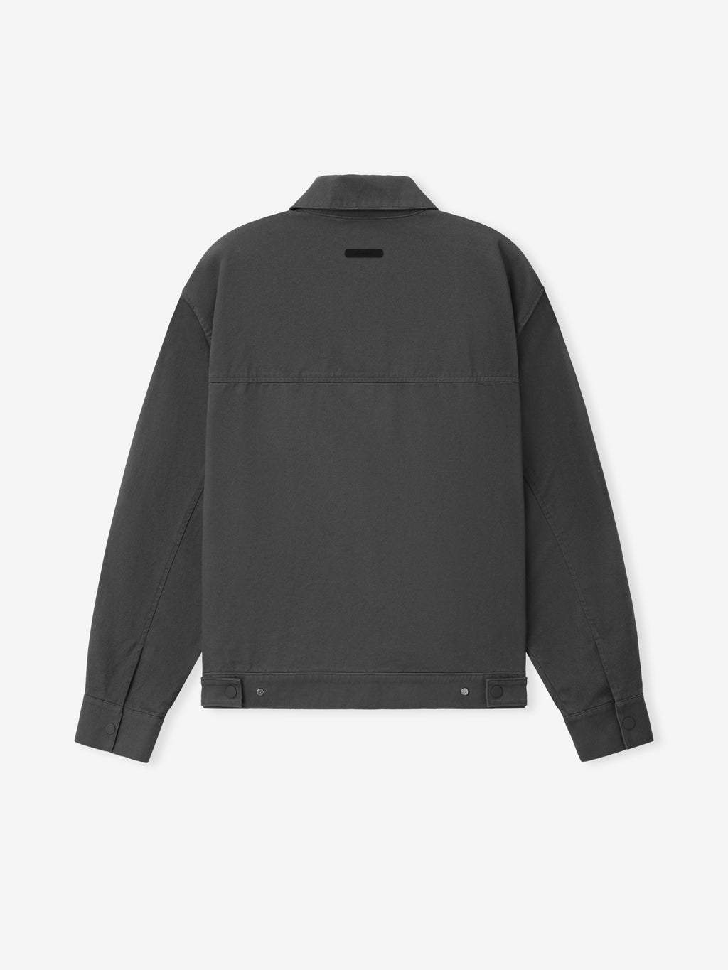 Cotton Twill Work Jacket in dark iron grey, showcasing a minimalist design with buttoned cuffs, adjustable waist tabs, and a subtle branded patch on the upper back, crafted as durable outerwear.