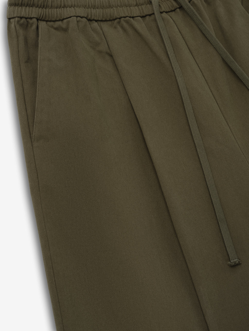 Cotton Twill Relaxed Drawstring Short in a muted olive green tone, featuring an elastic waistband with adjustable drawstrings, side pockets, and a comfortable relaxed fit for casual bottoms.