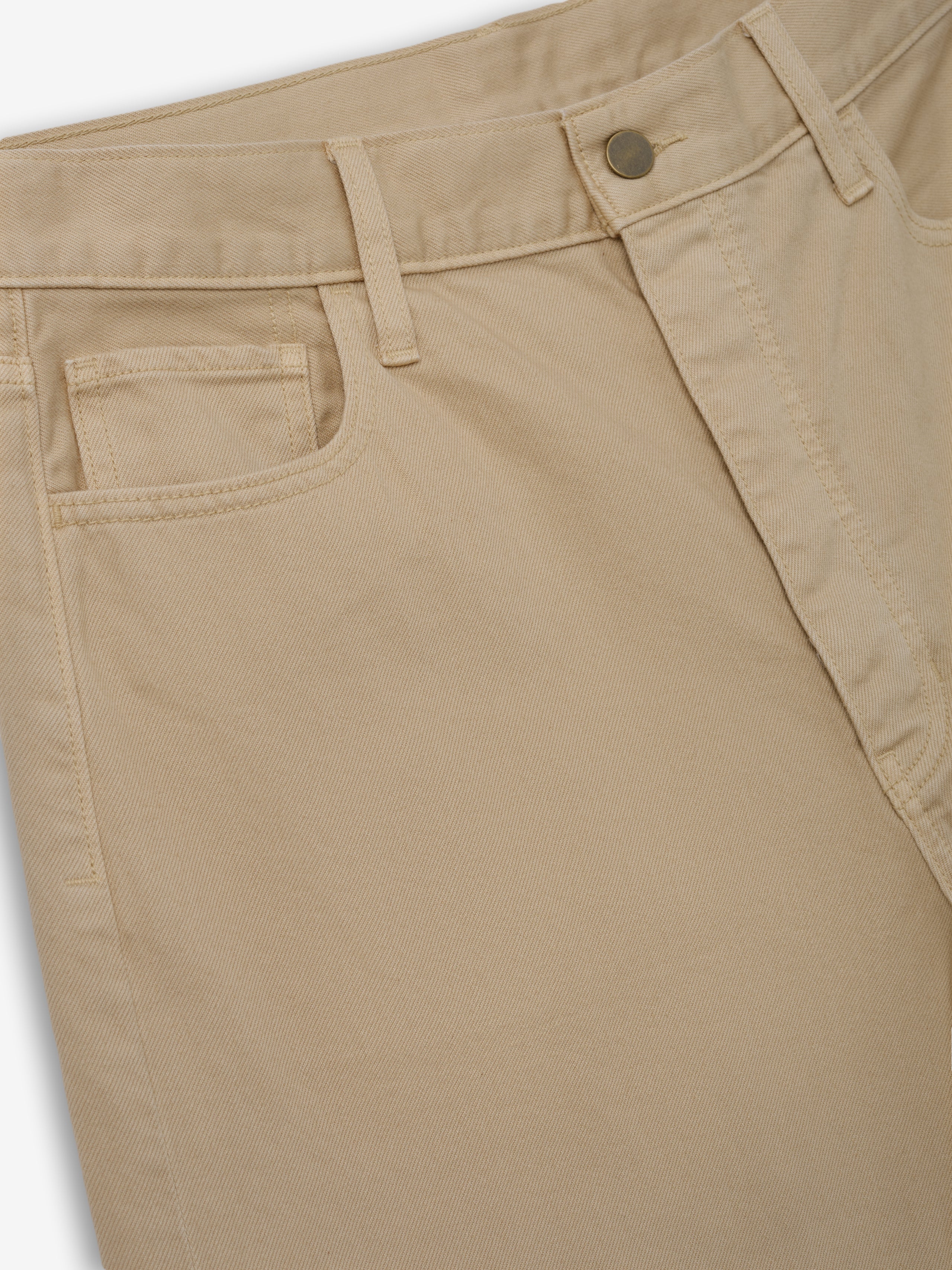 Denim 5-Pocket Jeans in a warm dune shade featuring classic five-pocket construction, belt loops, and a metal button closure for a versatile, stylish bottoms option.