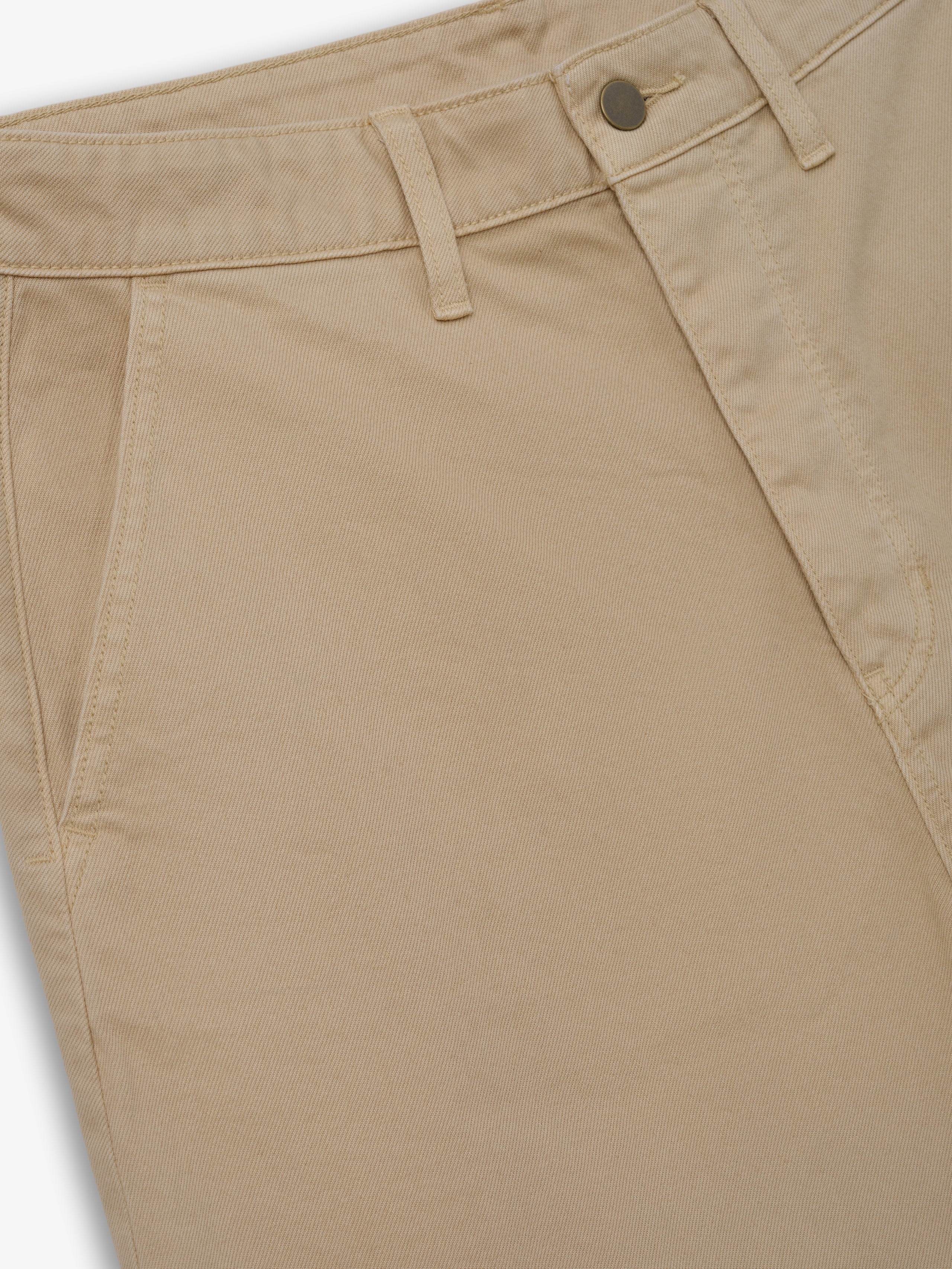 Raw Cut 5-Pocket Short in a natural dune tone, featuring structured cotton twill fabric, classic five-pocket design, belt loops, and a clean hem for versatile casual bottoms.