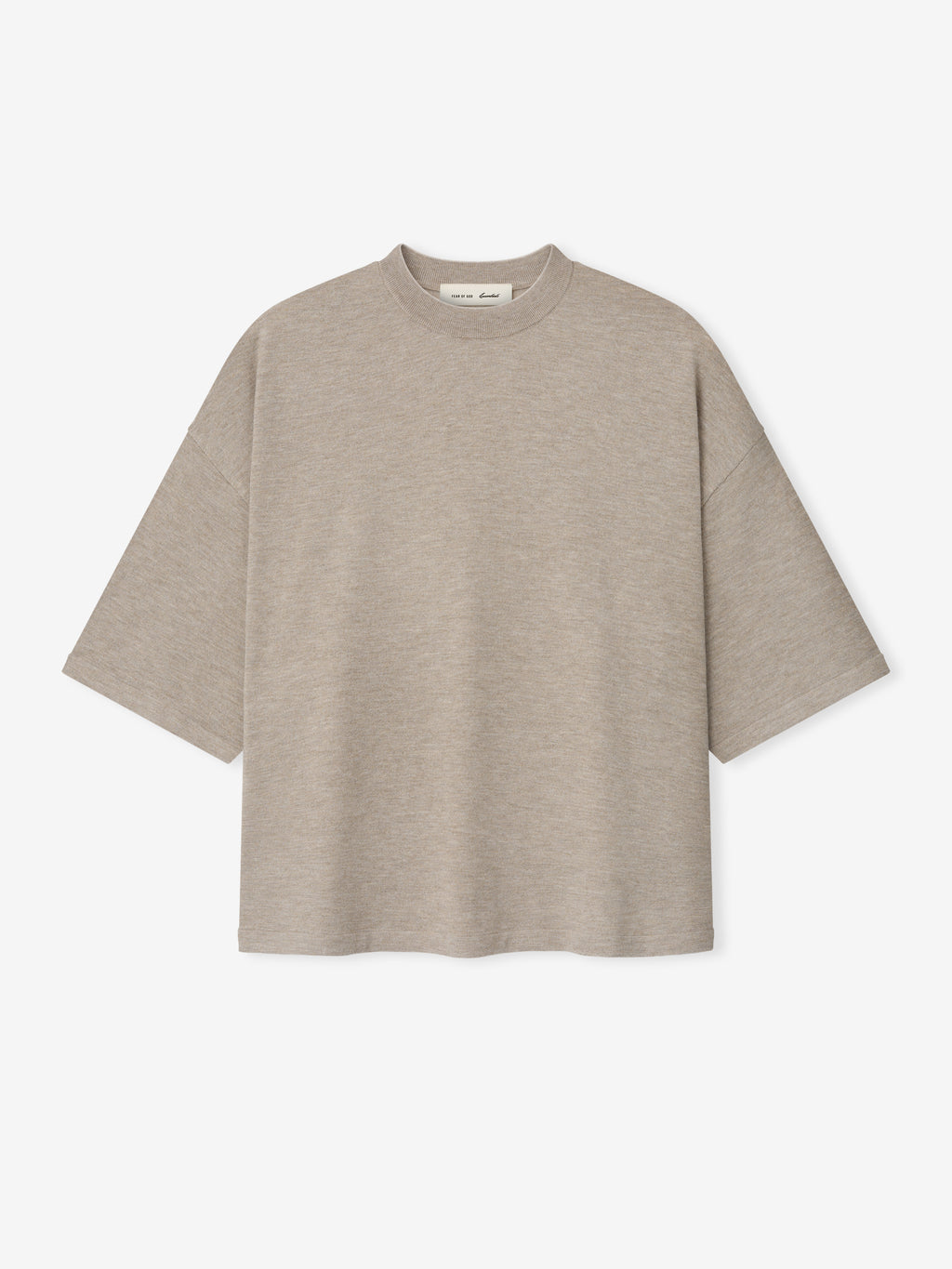 Soft Knit Tee in a muted beige heather tone, designed with a relaxed fit and wide short sleeves, featuring a smooth knit fabric and a classic crew neckline for versatile casual layering.