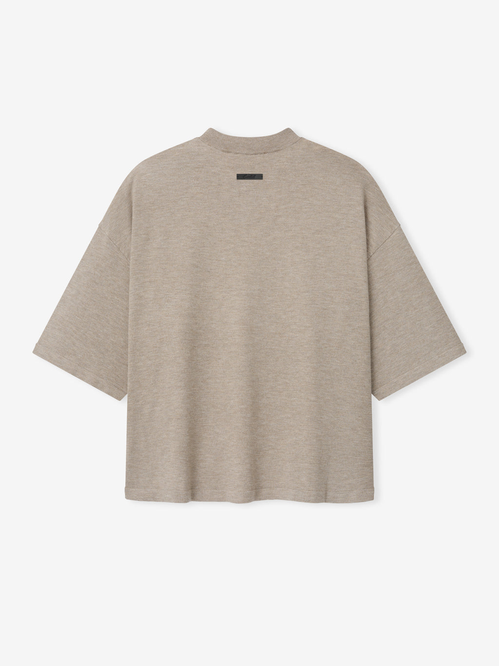 Soft Knit Tee in a muted beige tone, featuring an oversized fit with wide short sleeves and a smooth, finely knitted fabric for elevated casual tops.