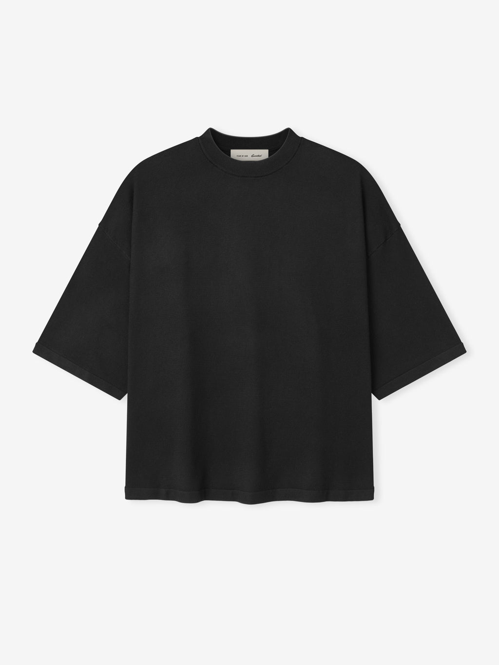 Soft Knit Tee in a deep black shade, featuring a relaxed fit with wide short sleeves and a smooth, soft knit fabric for comfortable, versatile casual tops.