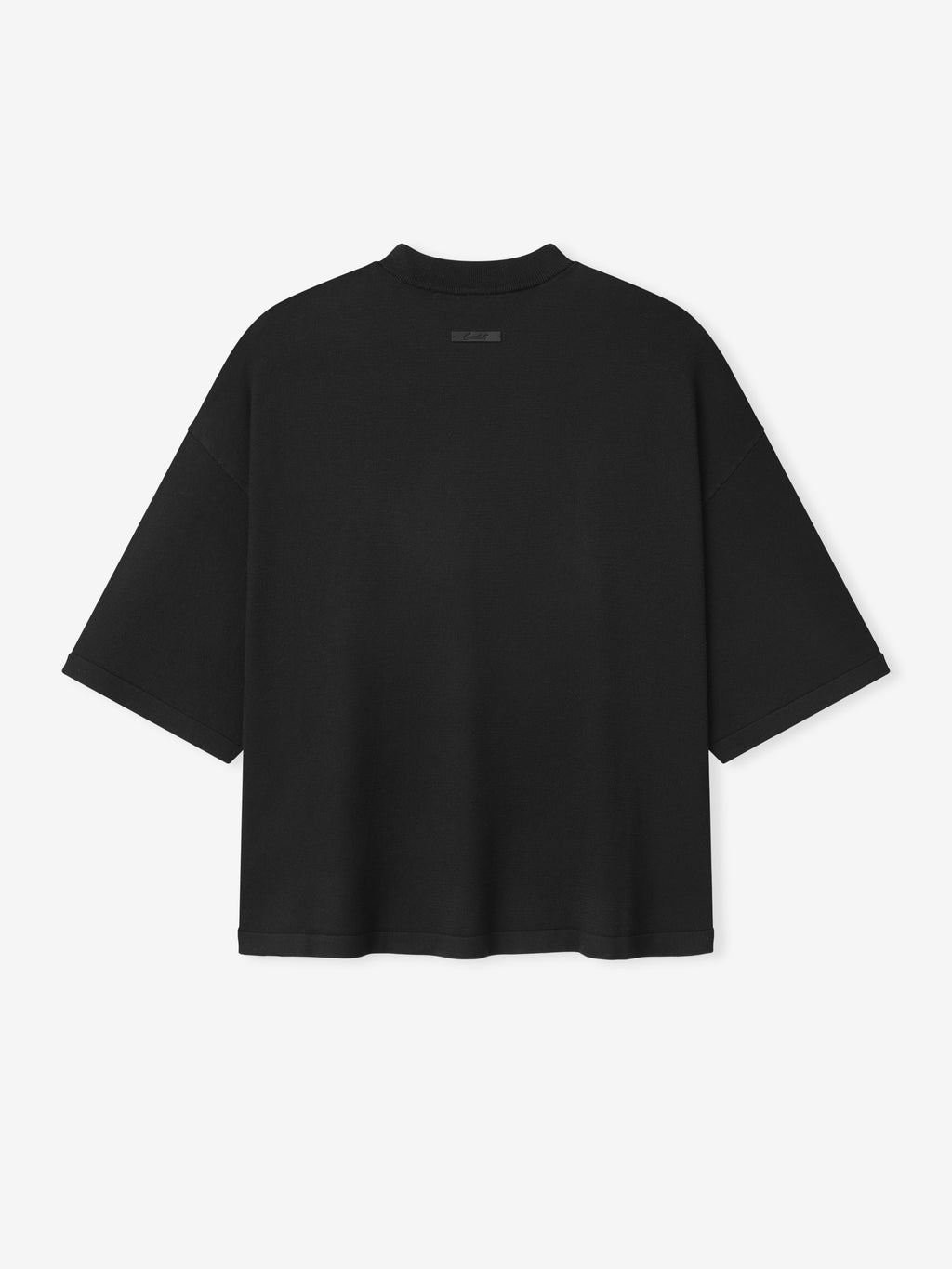 Soft Knit Tee in a vintage black tone, designed with an oversized fit and wide sleeves, featuring a smooth knit fabric for a stylish and comfortable casual top.