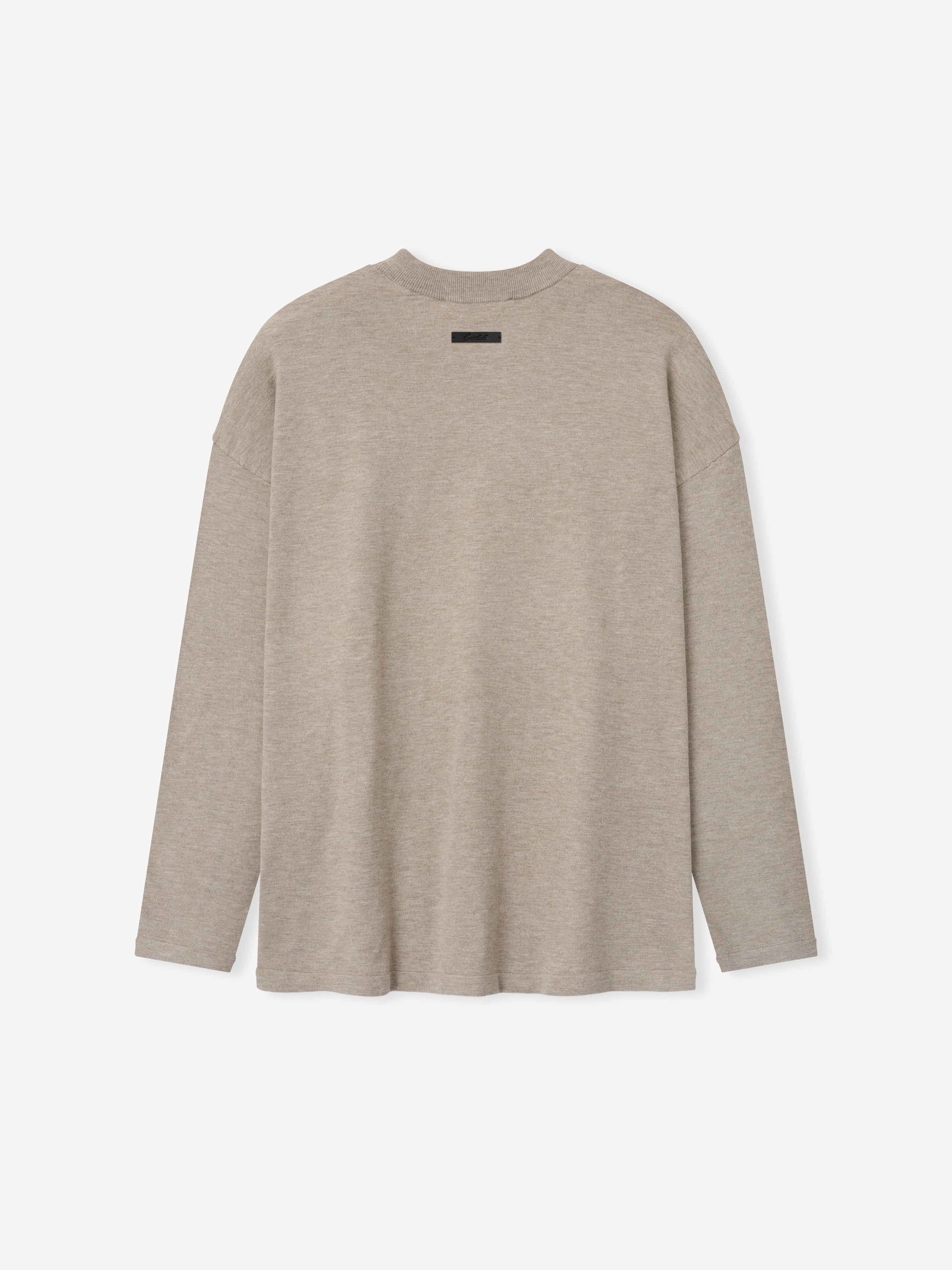 Soft Knit Long Sleeve Tee in a light beige heather shade, featuring a fine knit fabric with a relaxed fit and subtle dropped shoulder seams for a comfortable, casual look.