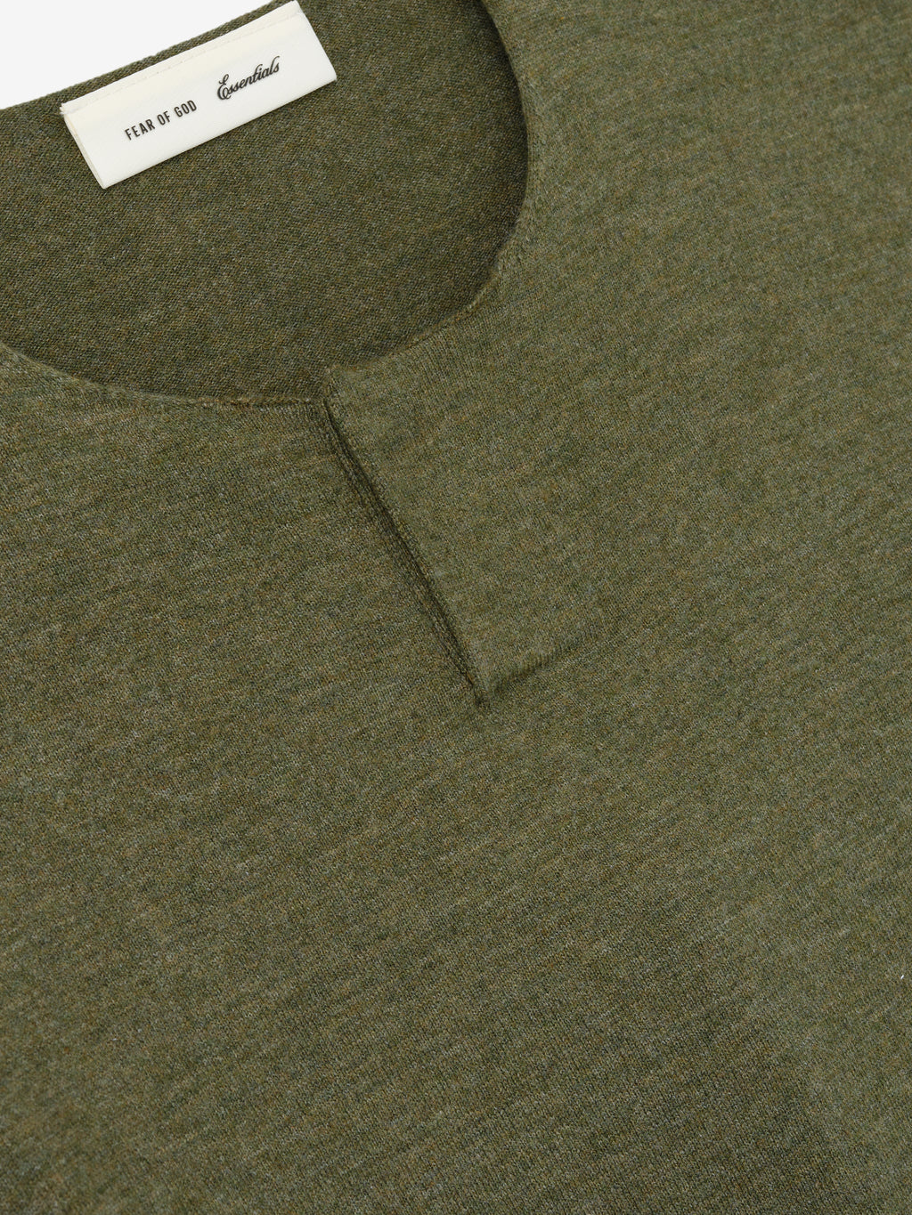Soft Knit Short Sleeve Henley in a muted moss green shade, featuring a subtle placket detail with a finely woven knit fabric and a smooth, soft texture for casual tops.