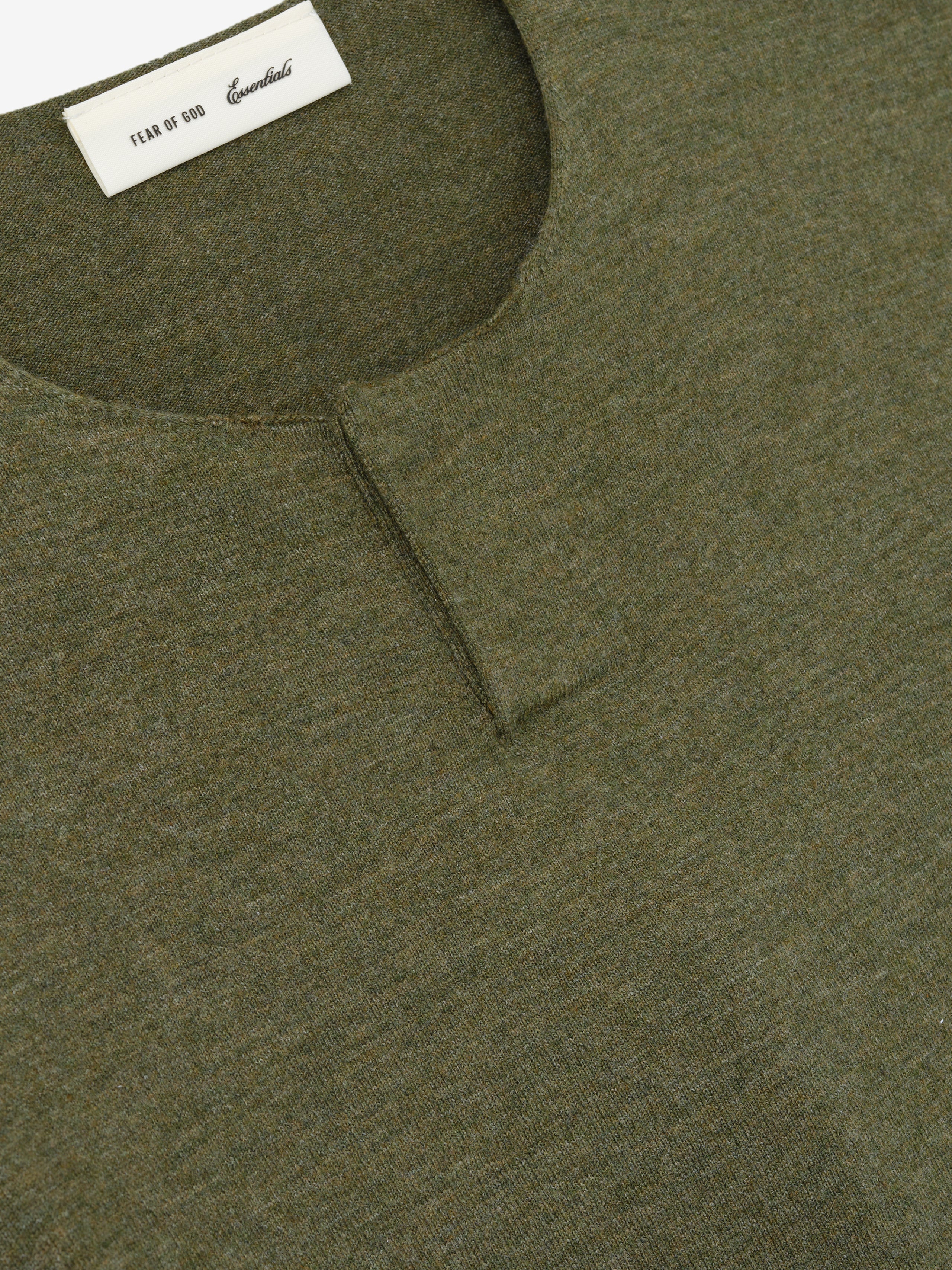 Soft Knit Short Sleeve Henley in a muted moss green shade, featuring a subtle placket detail with a finely woven knit fabric and a smooth, soft texture for casual tops.