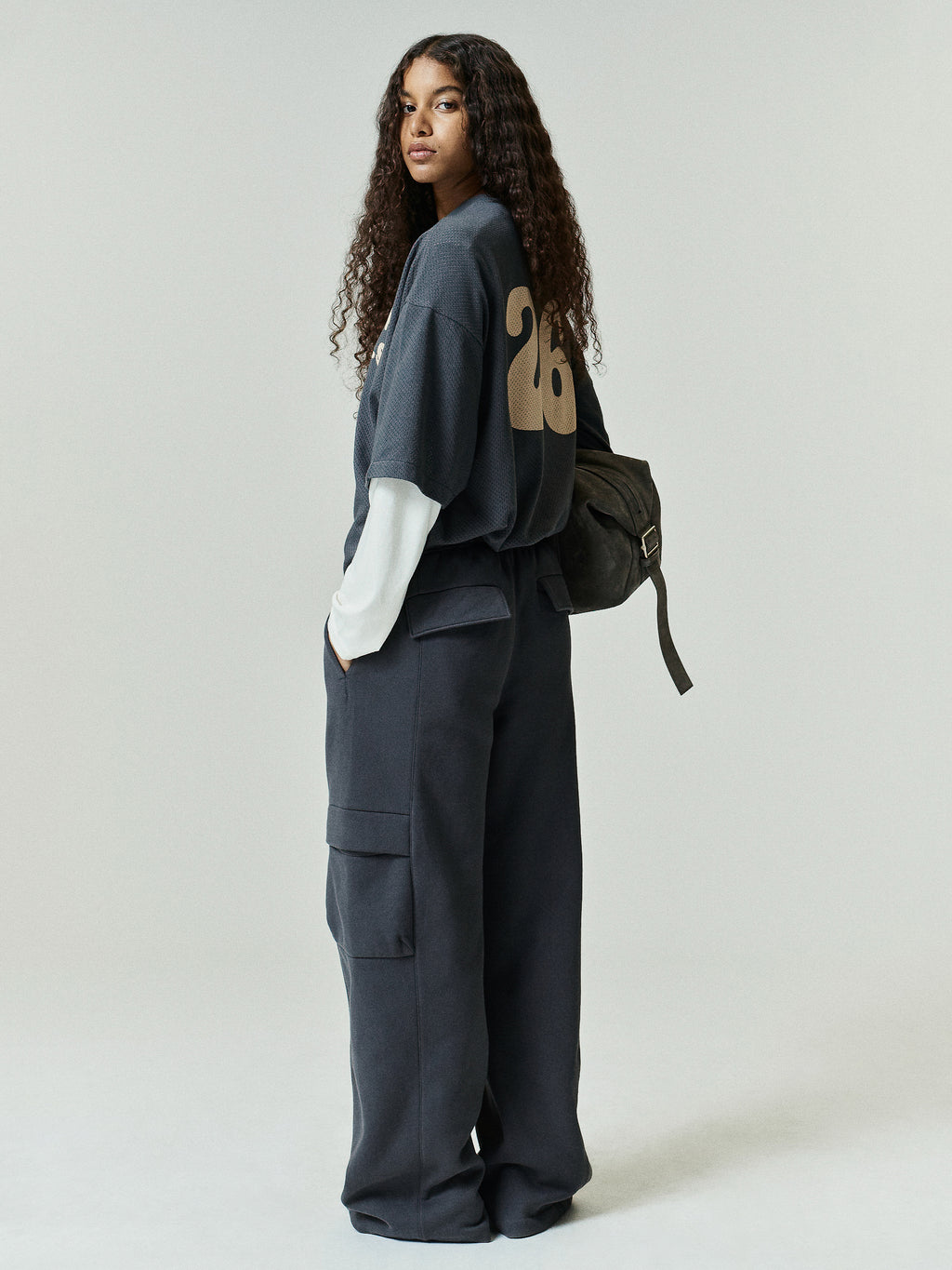 Womens Fleece Cargo Relaxed Sweatpant in dark charcoal grey featuring roomy cargo pockets and a loose fit for casual, comfortable bottoms perfect for everyday wear.