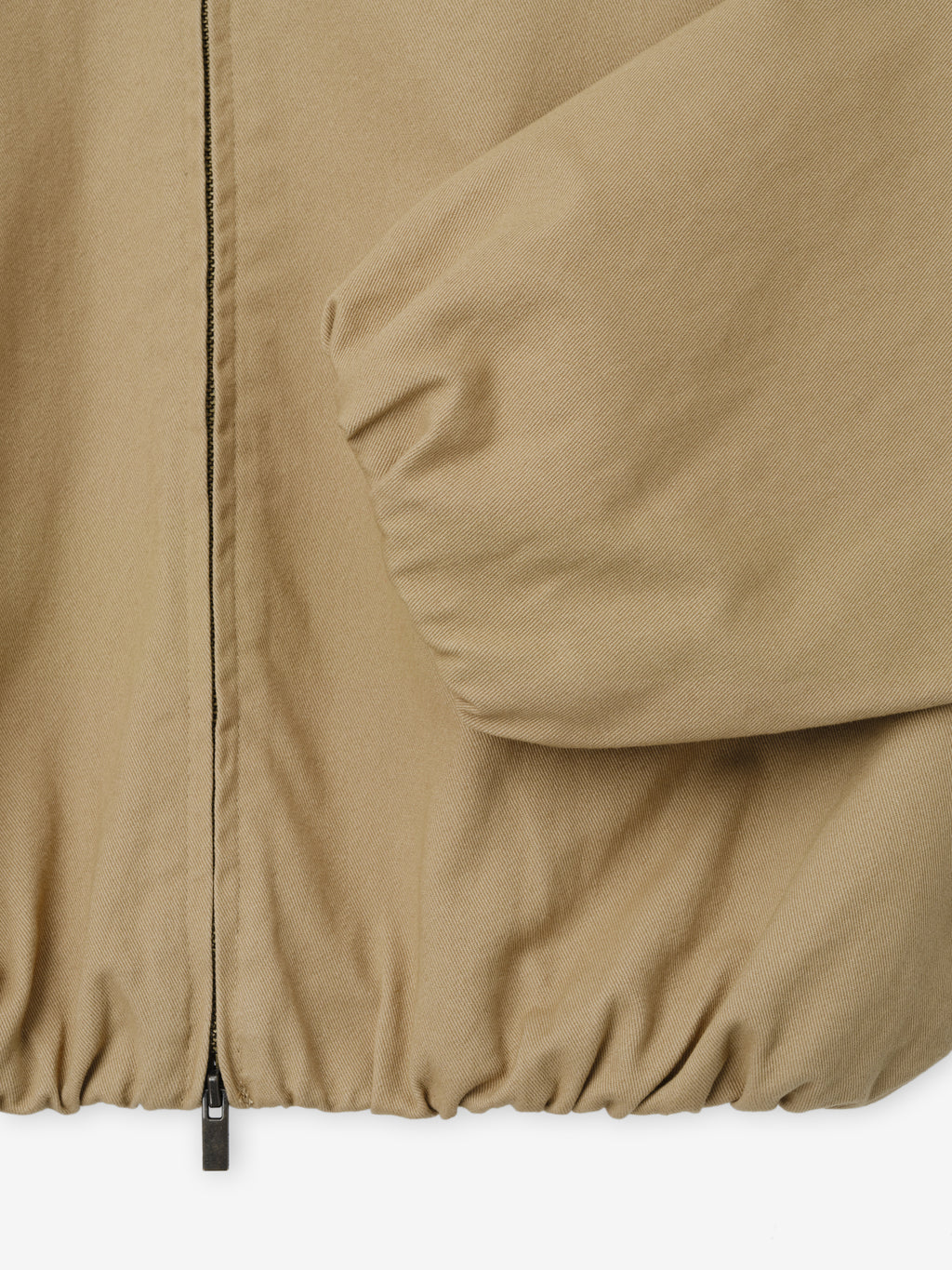 Womens Cotton Twill Work Jacket in a warm dune tone showcasing elasticized cuffs and hem with a full front zipper for functional and stylish outerwear layering.