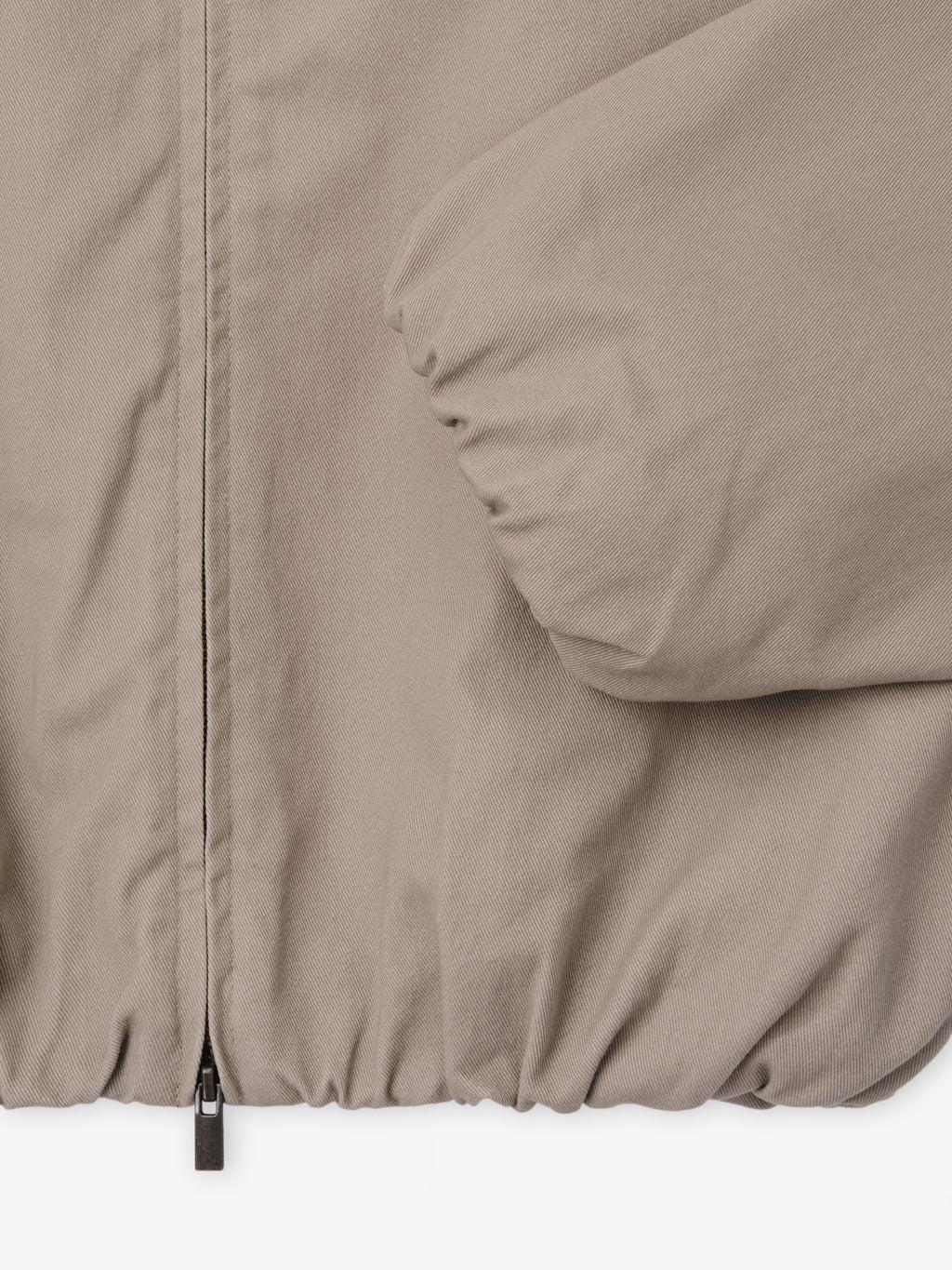 Full Zip Work Jacket in a soft taupe shade featuring a durable cotton twill fabric with elasticized hem and visible front zipper for a structured yet comfortable outerwear fit.