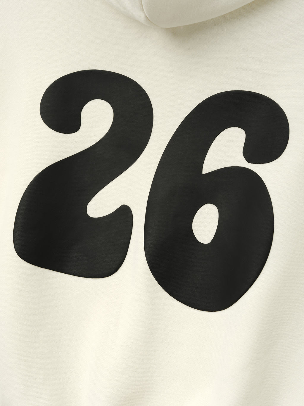 Kids 90'S Hoodie in a soft ivory shade showcasing a bold, oversized black "26" graphic on the back, crafted from comfortable fabric for casual outerwear style.