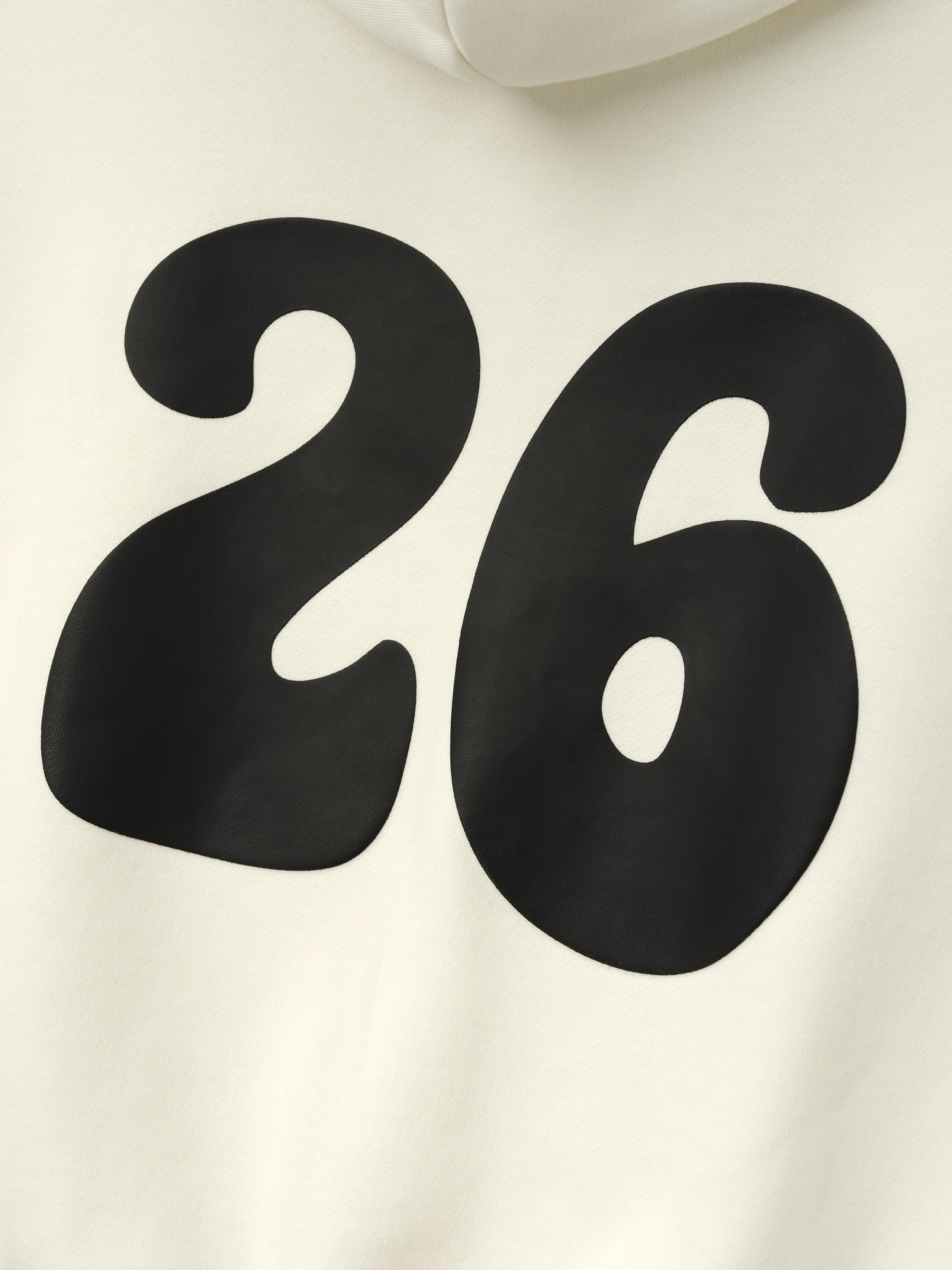 Kids 90'S Hoodie in a soft ivory shade showcasing a bold, oversized black "26" graphic on the back, crafted from comfortable fabric for casual outerwear style.