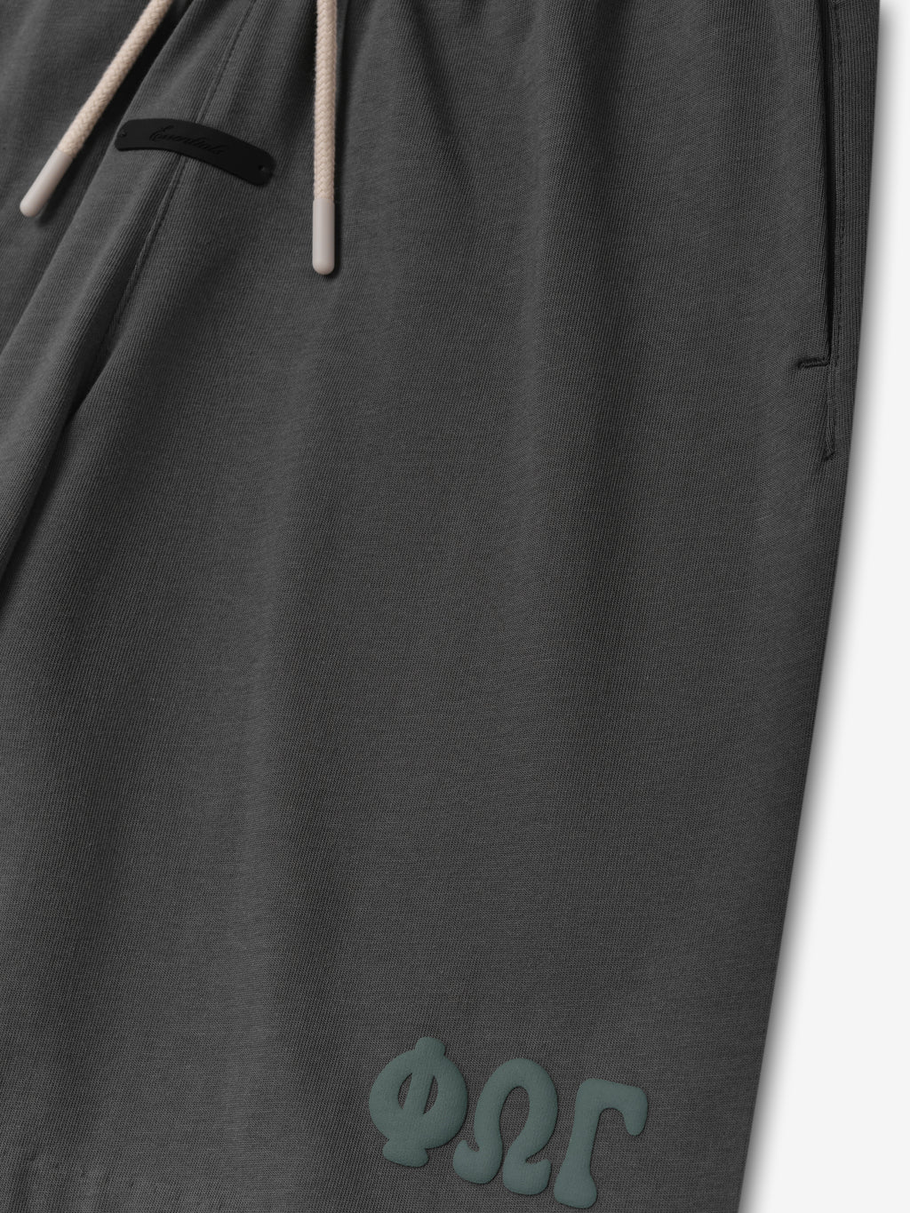 Kids 90'S Jersey Sweatshort in iron grey featuring a soft fabric with an adjustable drawstring waistband and subtle branded detailing near the hem for casual bottoms.