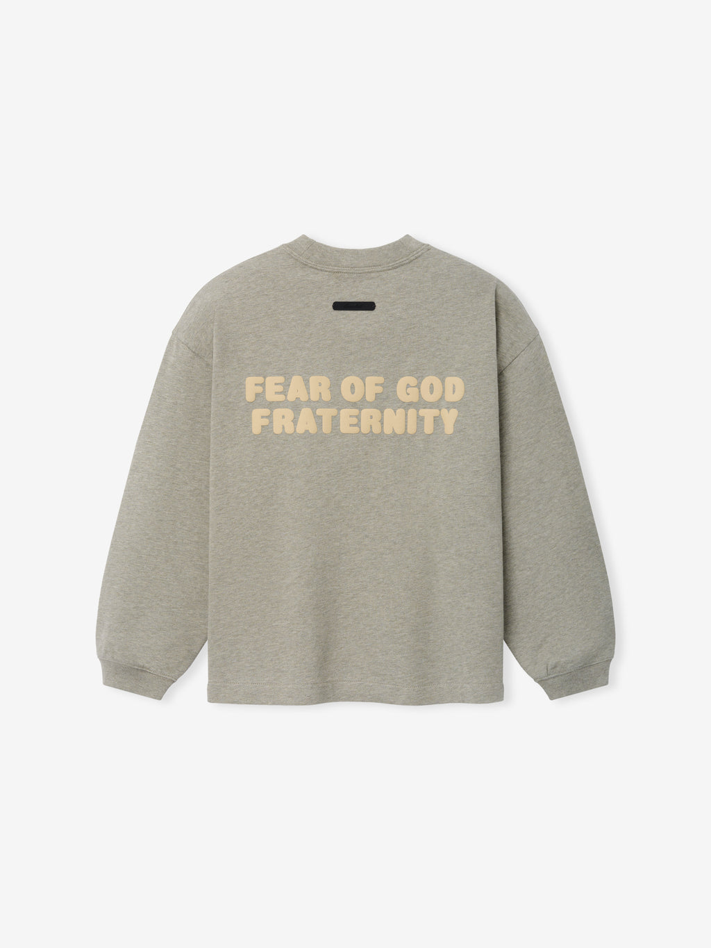 Kids Merch Long Sleeve Tee in muted gray heather fabric featuring bold cream-colored text reading "Fear of God Fraternity" across the back, with ribbed cuffs and relaxed fit for casual comfort.