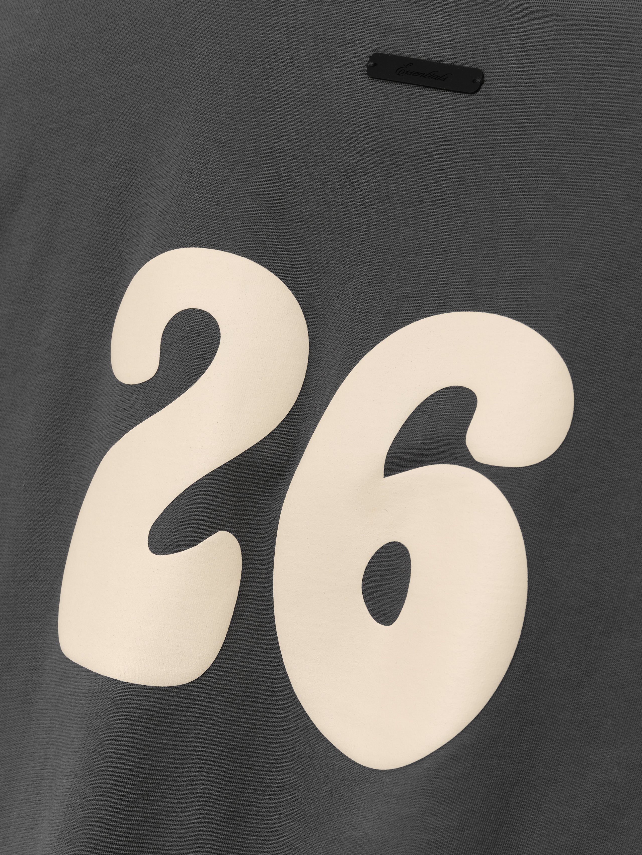 Kids Merch Tee in iron gray fabric featuring a large cream-colored number "26" in a rounded, playful font for a sporty and casual kids' top.