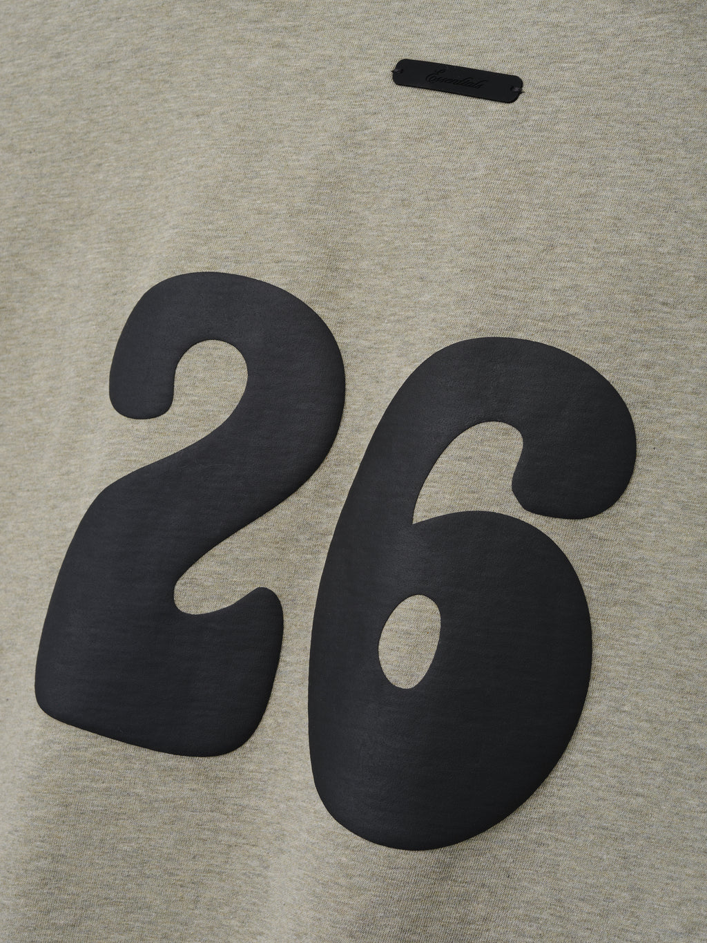 Kids Merch Tee in soft heather gray fabric featuring large black rounded number "26" printed on the front for a sporty and casual kids' top.