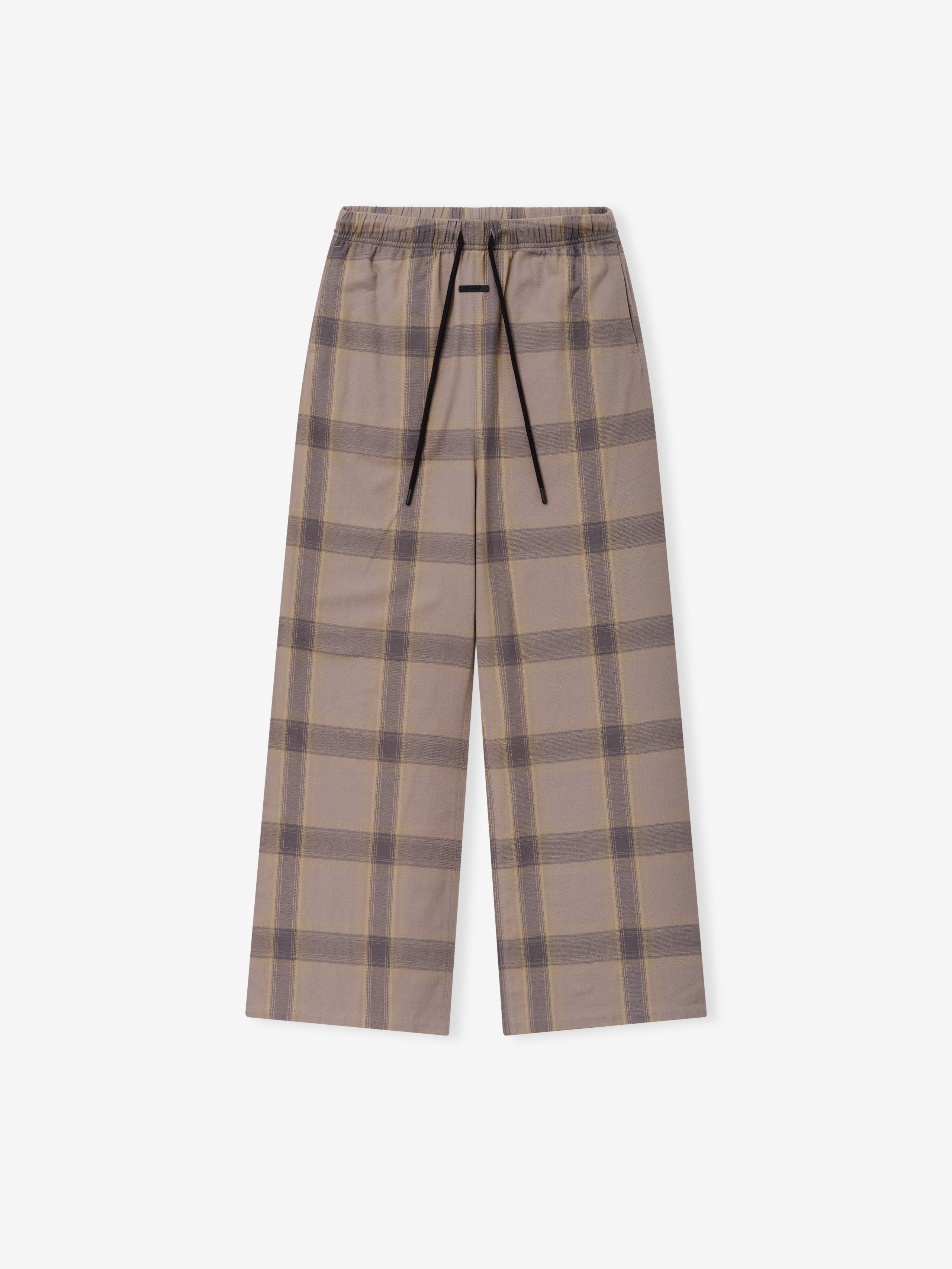Womens Flannel Lounge Pant in a muted plaid pattern featuring soft beige and gray tones with wide legs and an elastic waistband with black drawstrings for a relaxed fit.