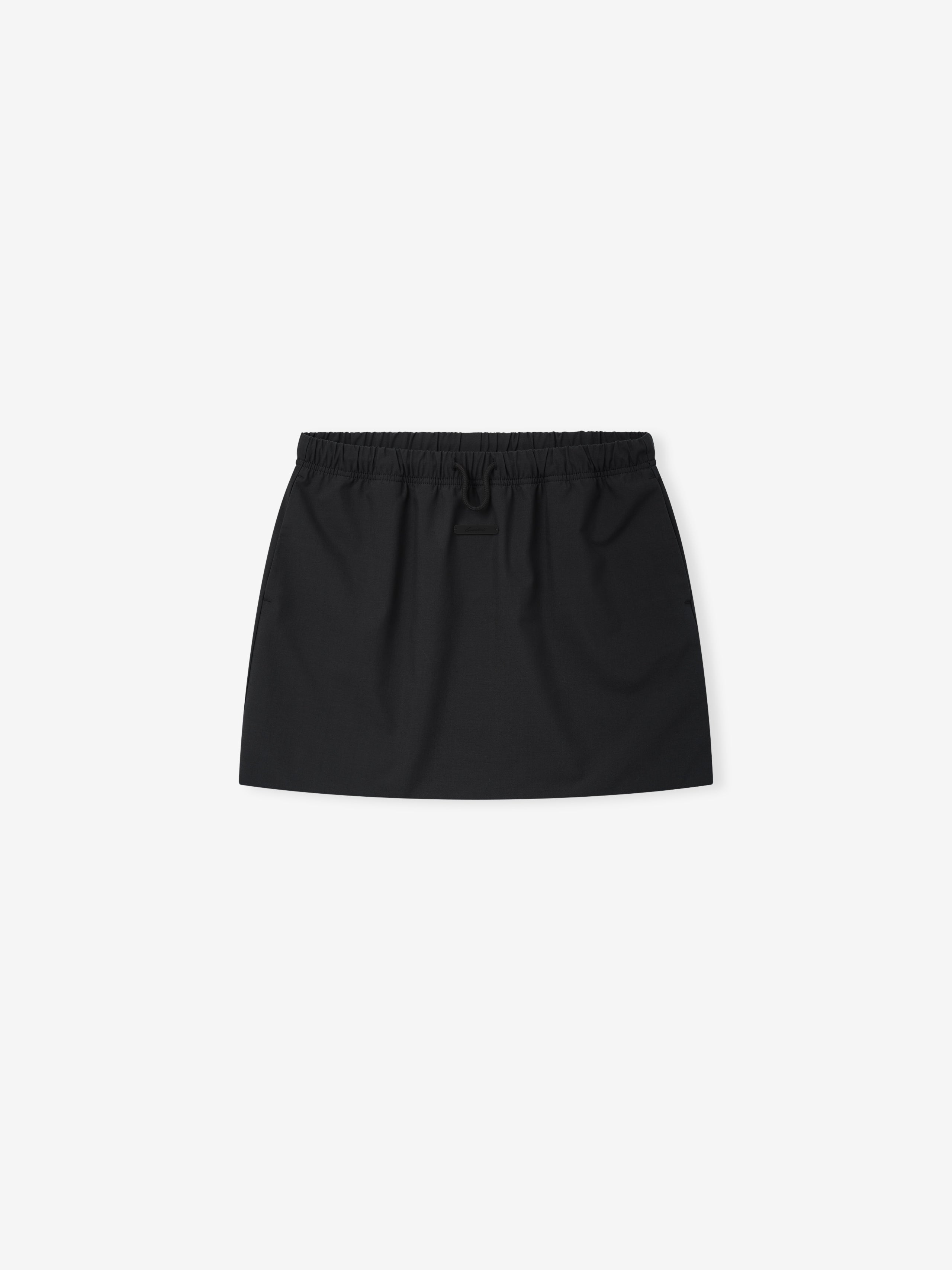 Womens Silk Blend Micro Skirt in a deep black hue featuring a smooth silk-blend fabric with an elastic waistband for a sleek, comfortable modern bottom piece.