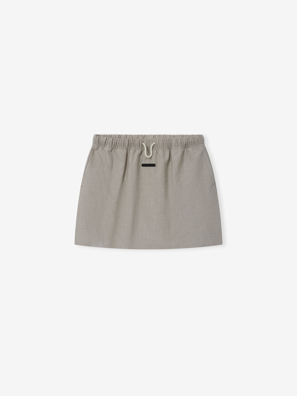 Micro Skirt in a muted seal tone with an elastic waistband and drawstring detail, crafted from a smooth, lightweight fabric for a clean and modern bottom.