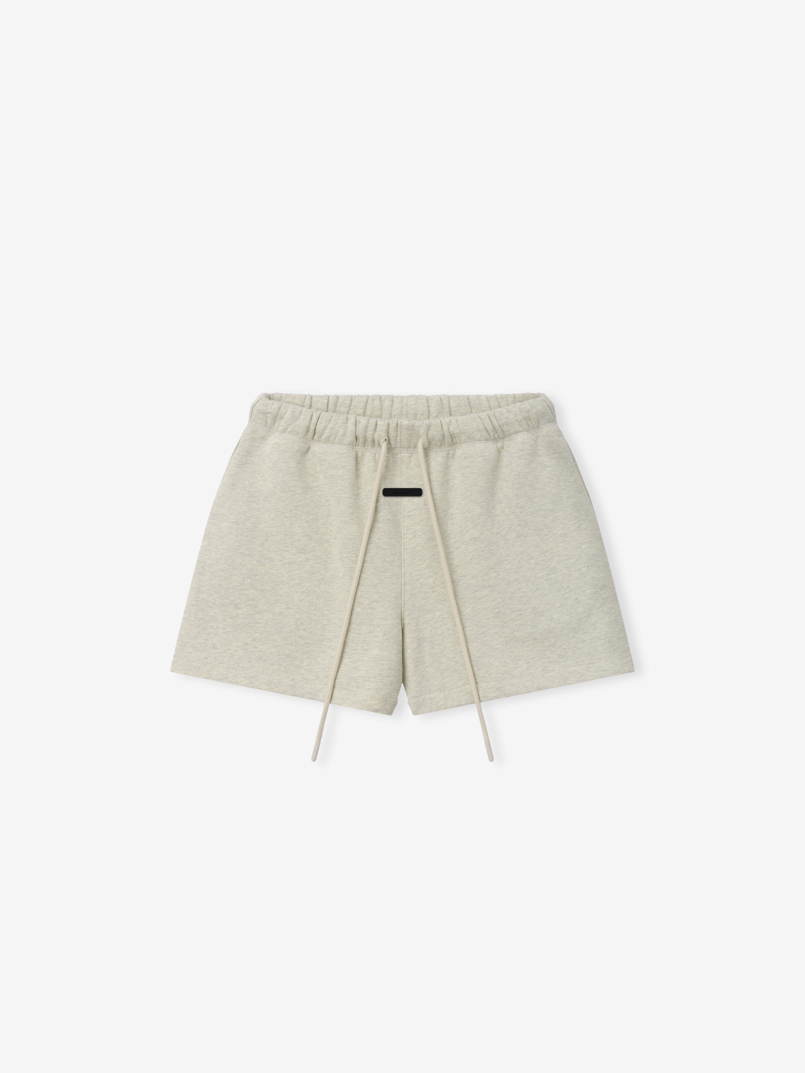 Womens Classic Fit Short in a soft washed vanilla heather tone featuring an elastic waistband with long drawstrings, subtle front detail, and a relaxed silhouette ideal for casual bottoms.