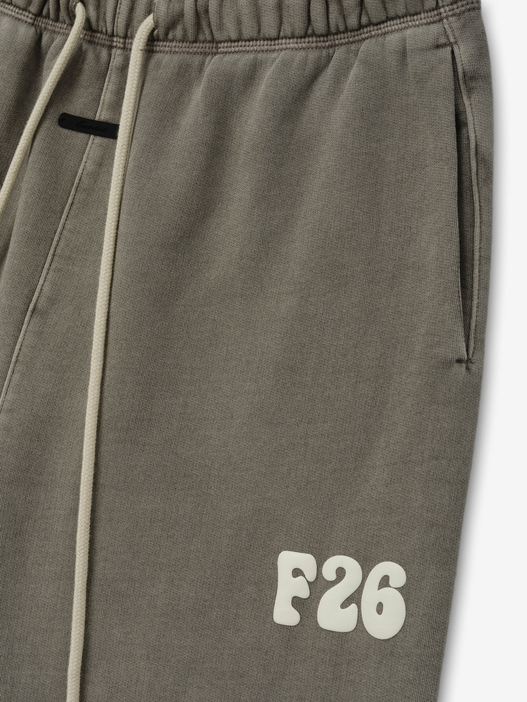 Womens Classic Fleece Sweatpant in a muted washed seal shade featuring an elastic waistband with contrasting light drawstrings, side pockets, and bold raised F26 branding on the thigh for casual bottoms.