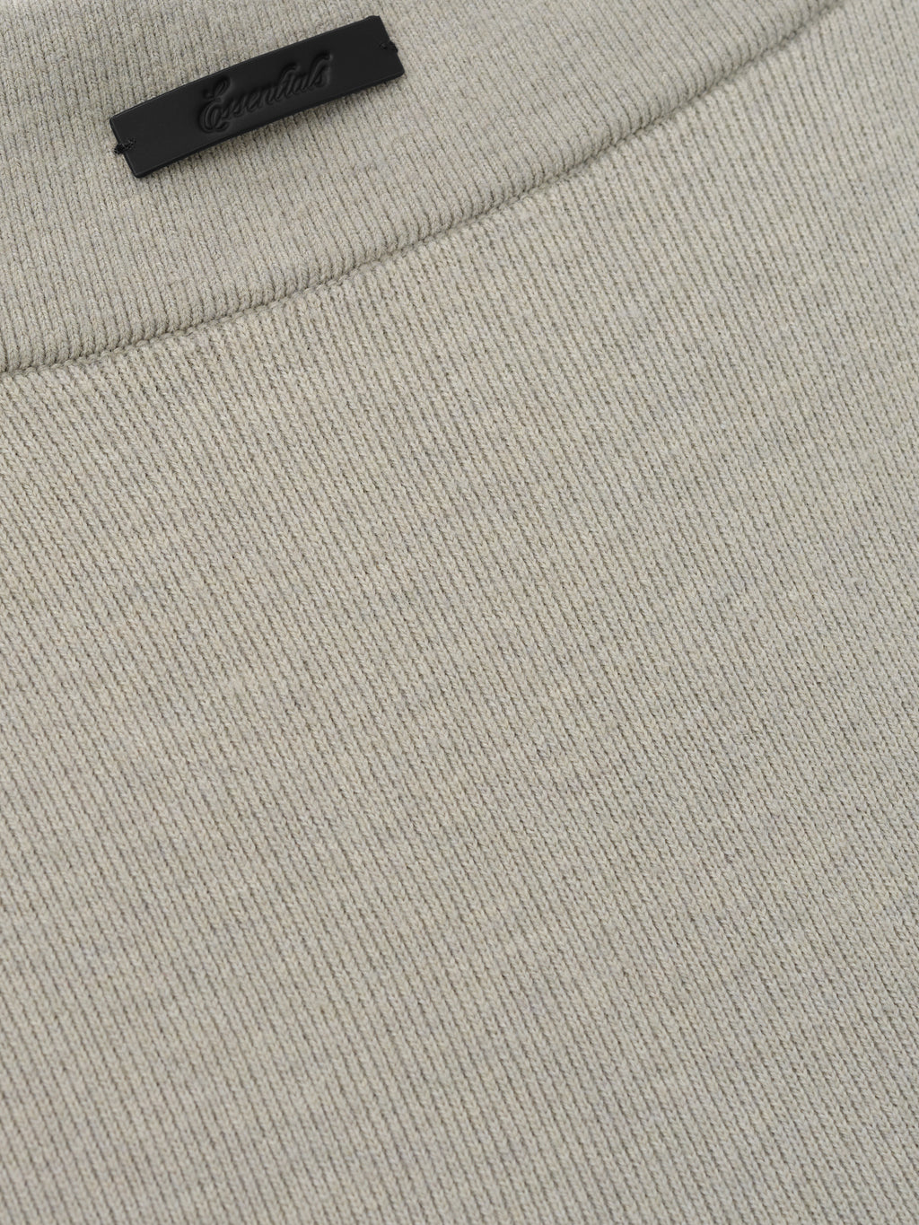 Womens Rib Knit Biker Short in a soft muted beige shade, featuring finely ribbed fabric that provides a flexible, comfortable fit with subtle texture for casual everyday wear.