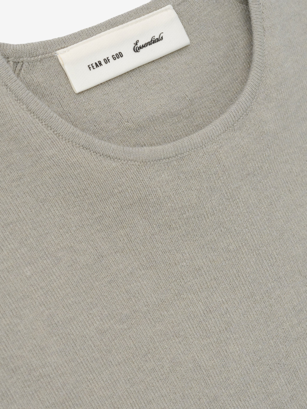 Womens Rib Knit Crop Top in a soft muted beige tone, featuring fine ribbed fabric with a smooth round neckline for a minimal and comfortable casual top.