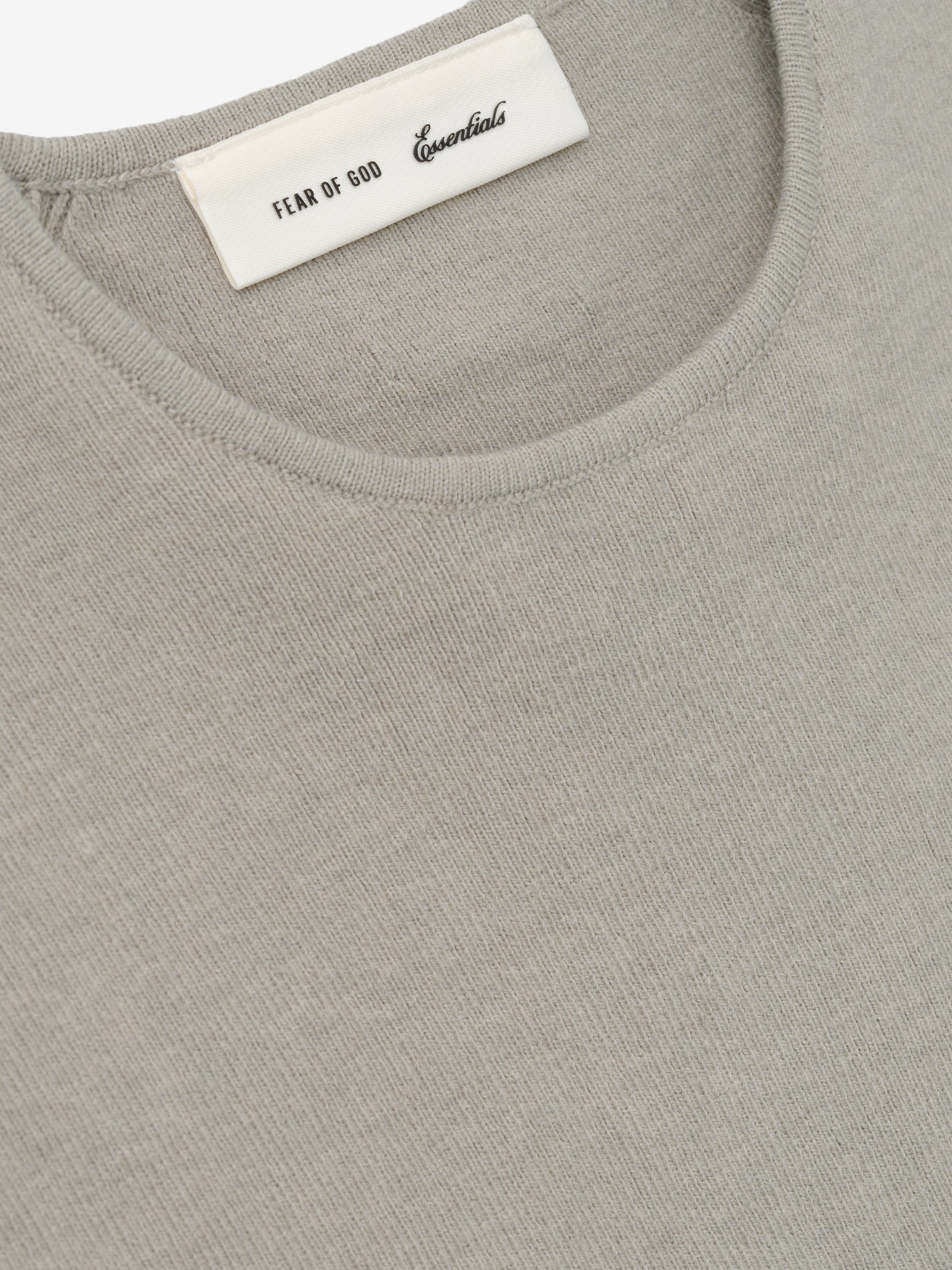 Womens Rib Knit Crop Top in a soft muted beige tone, featuring fine ribbed fabric with a smooth round neckline for a minimal and comfortable casual top.