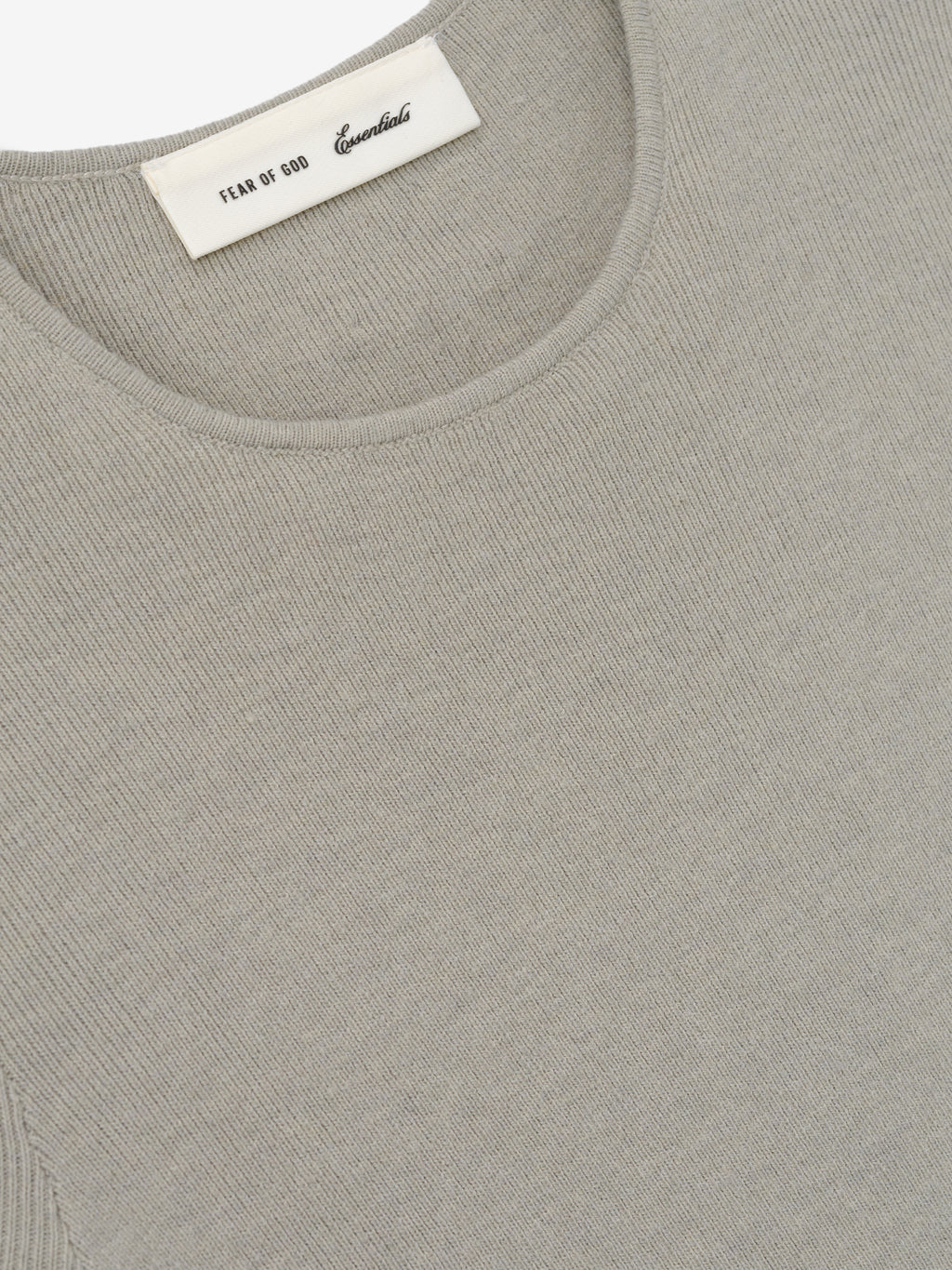 Womens Rib Knit Dress in a soft muted taupe shade, featuring a finely ribbed texture with a smooth, rounded neckline for a minimalist and refined look.