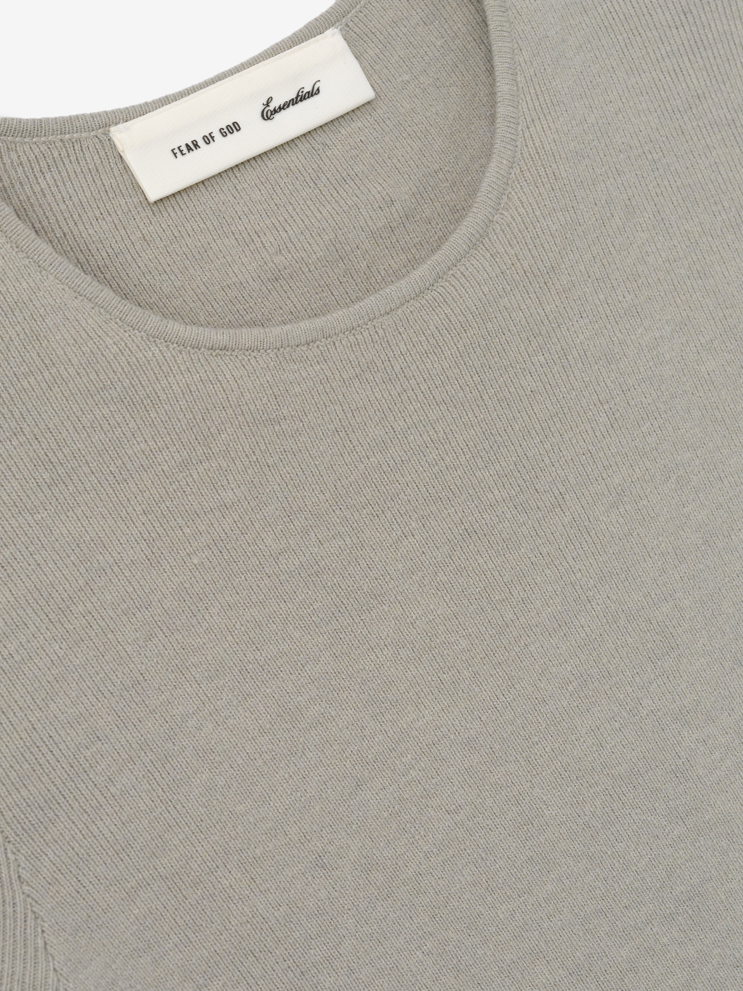 Womens Rib Knit Dress in a soft muted taupe shade, featuring a finely ribbed texture with a smooth, rounded neckline for a minimalist and refined look.