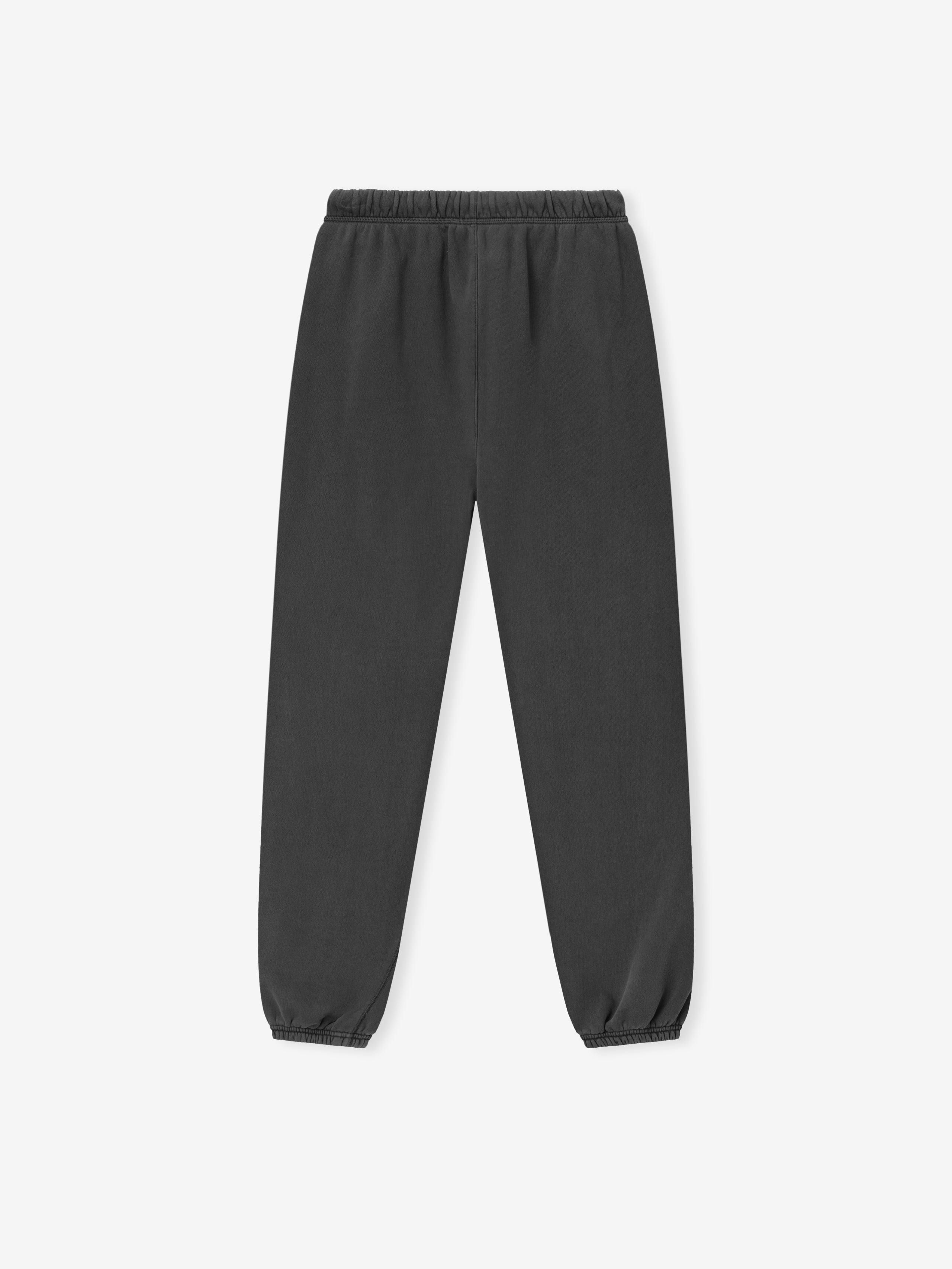 Classic Fleece Sweatpant in a deep charcoal grey with an elastic waistband and cuffs, designed for a minimalist, comfortable fit in casual bottoms.