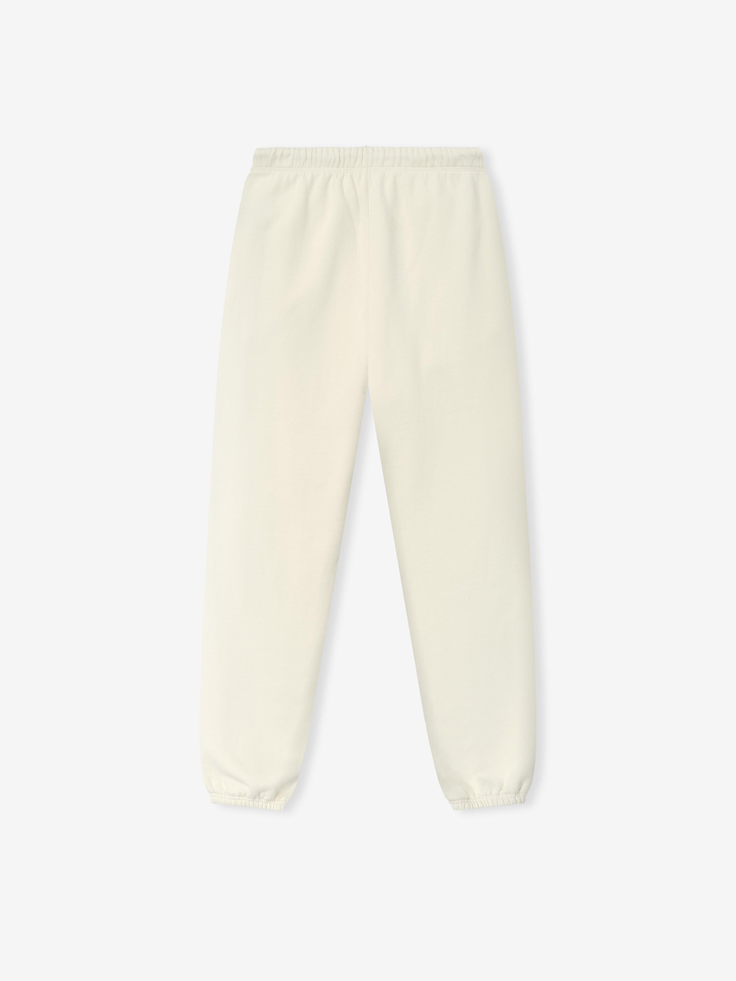 Classic Fleece Sweatpant in a soft ivory tone featuring an elastic waistband, side pockets, and elastic cuffs for a comfortable fit in casual bottoms.