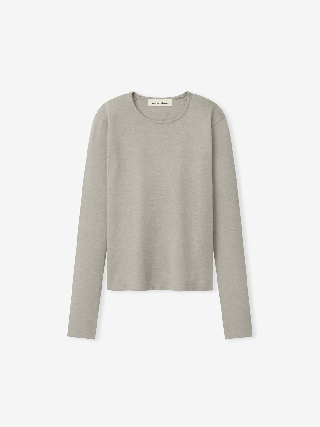 Womens Soft Knit Slim Longsleeve in a soft pale grey shade, featuring a finely textured knit fabric with a clean round neckline and tailored slim fit for versatile casual tops.